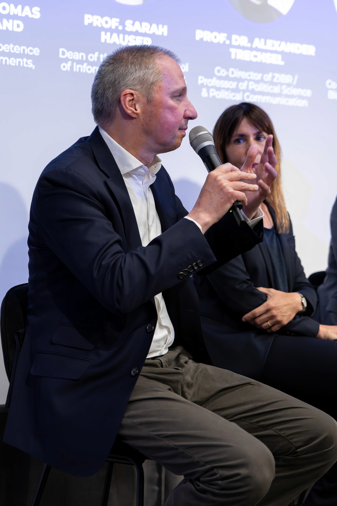 Speaker participating in a blockchain panel discussion at CV Summit.