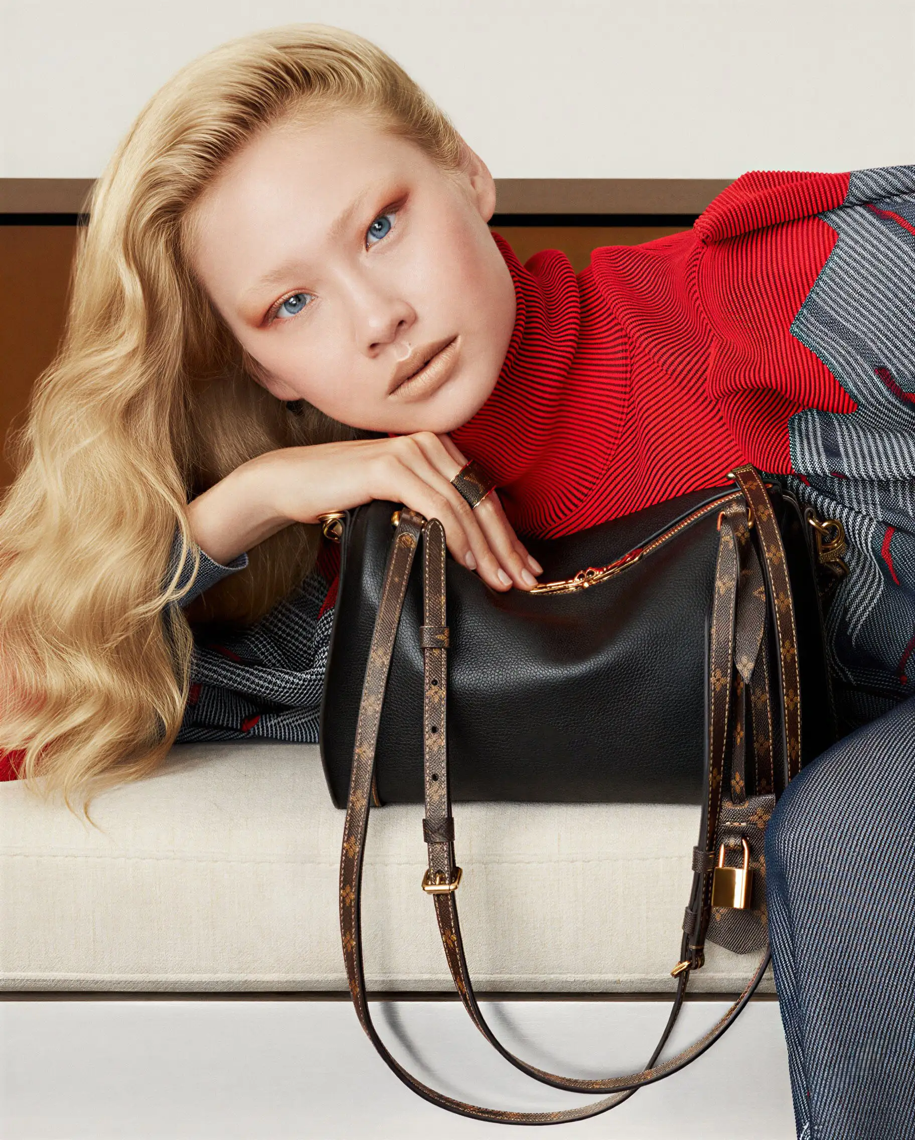Pastel colored sky over calm ocean water
