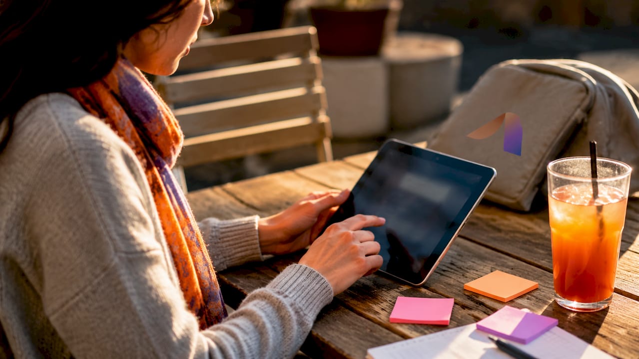 Hands using tablet for AI return processing