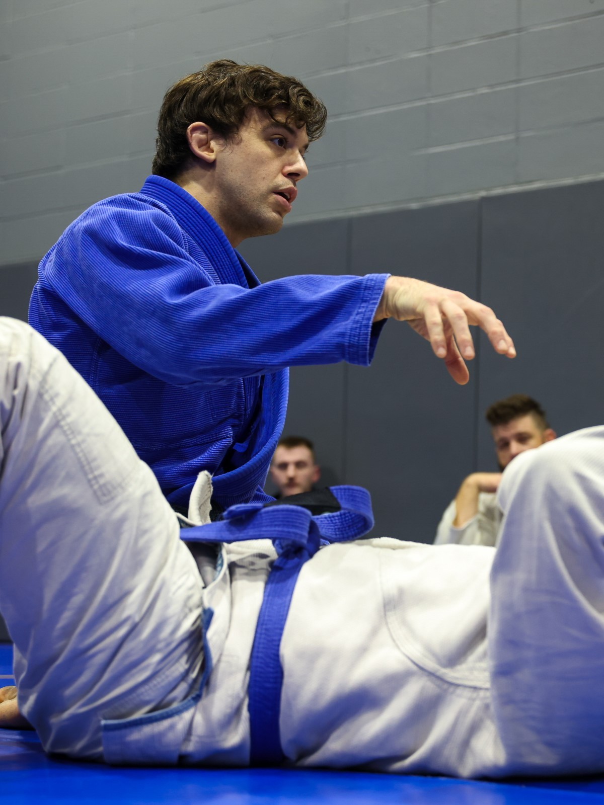 Coach Drake teaching the art of Brazilian Jiu Jitsu