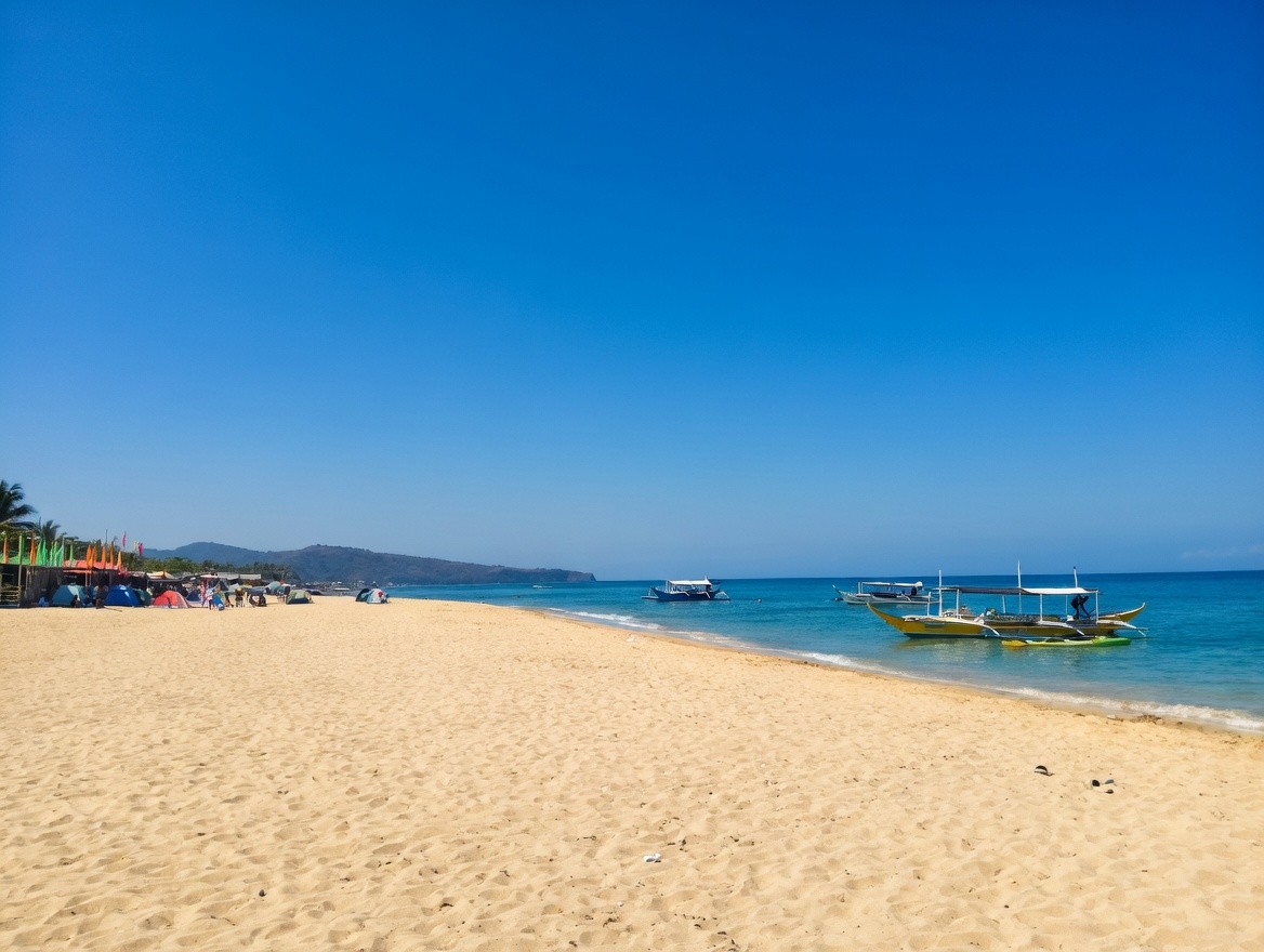 Direct beach access and garden terrace overlooking the sea at Oktowaves Hotel Nasugbu