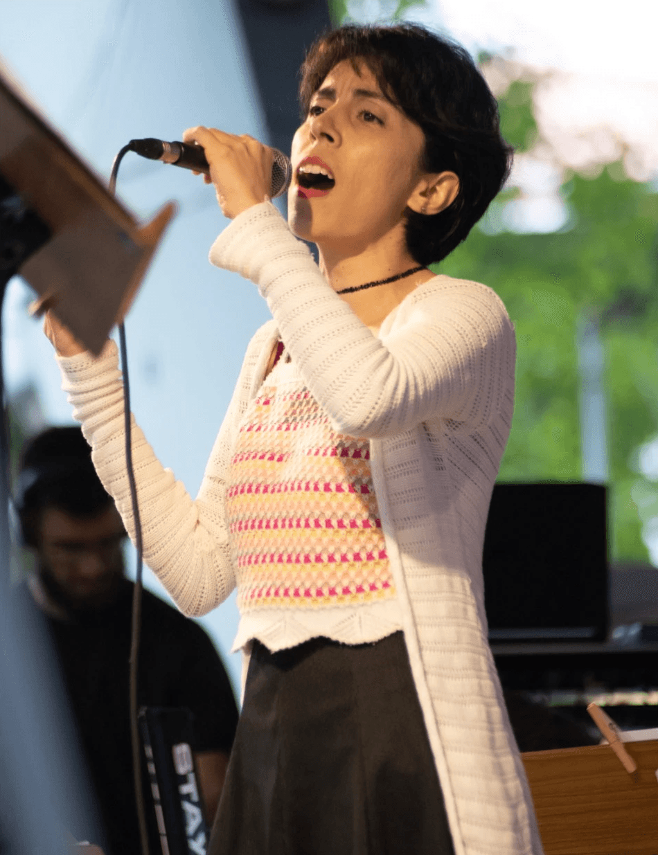 baby playing multicolored xylophone toy