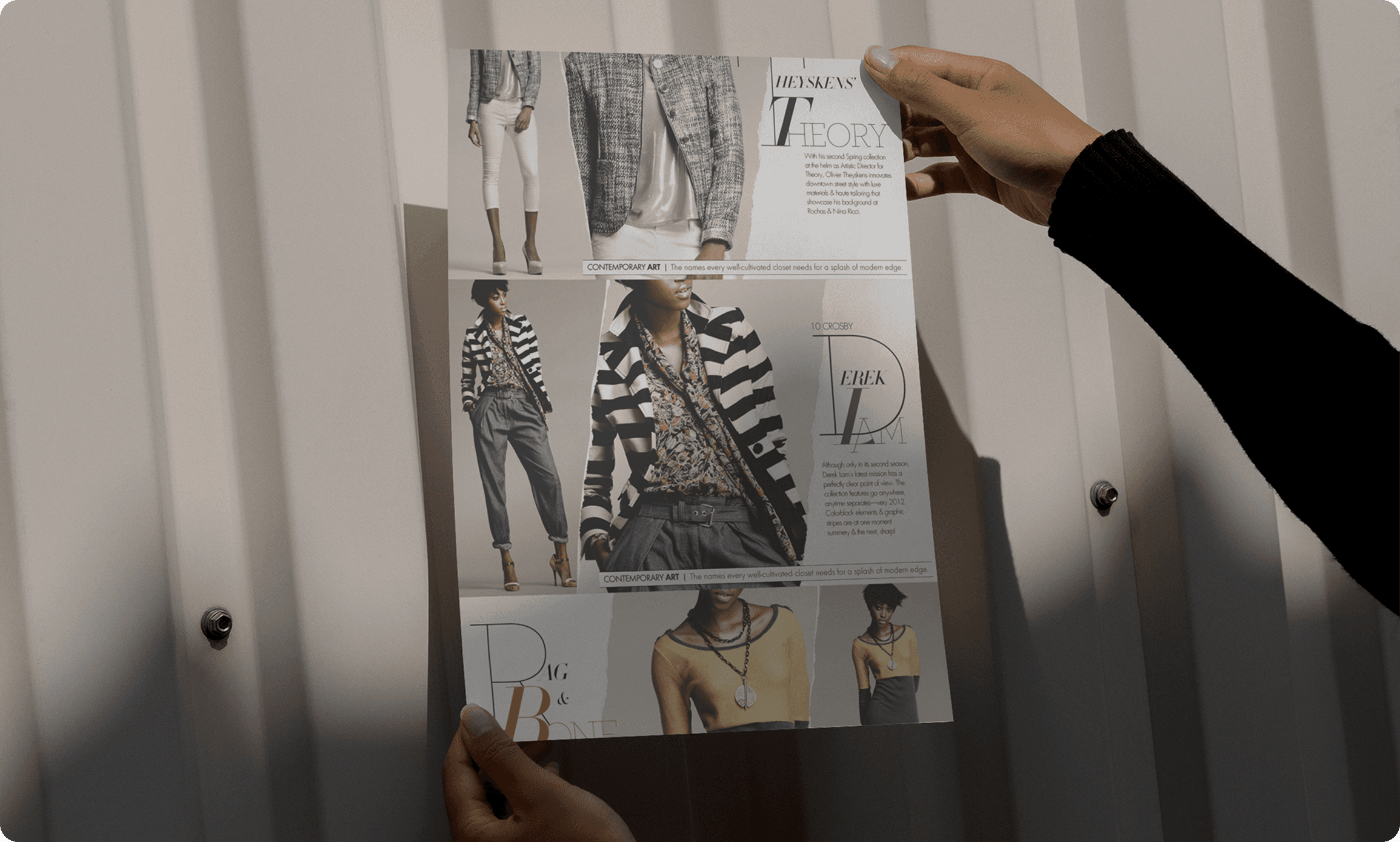 Hands holding fashion editorial layout with model photos and typography for Neiman Marcus design project