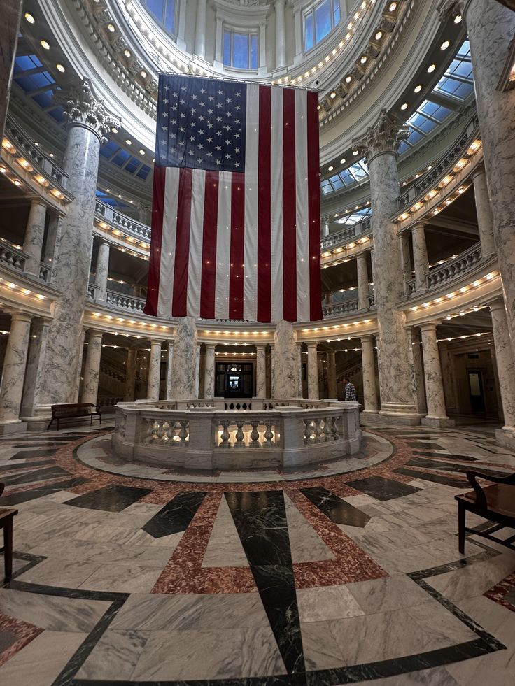a white shelf with objects on it