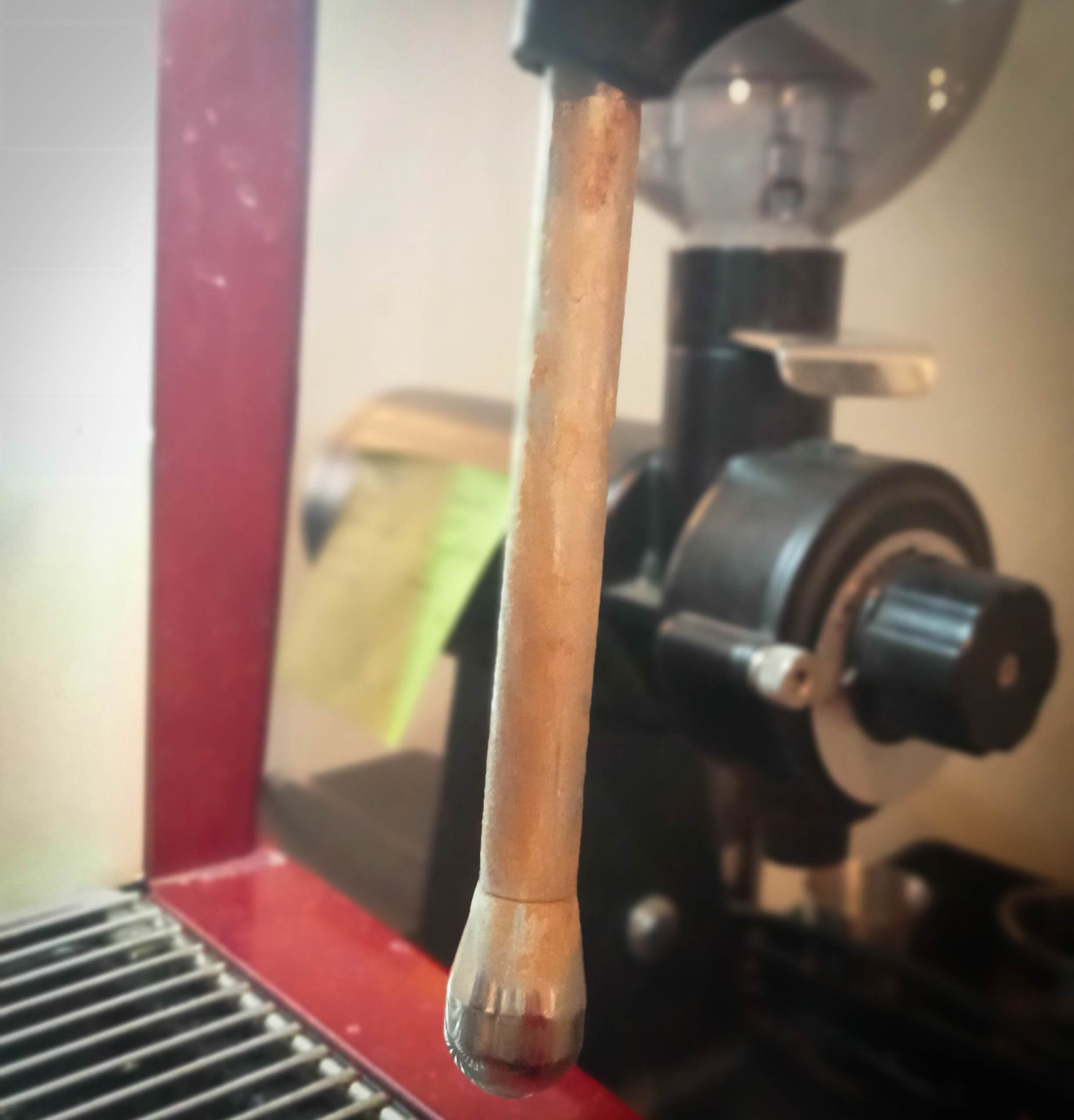 close up of a dirty steam wand