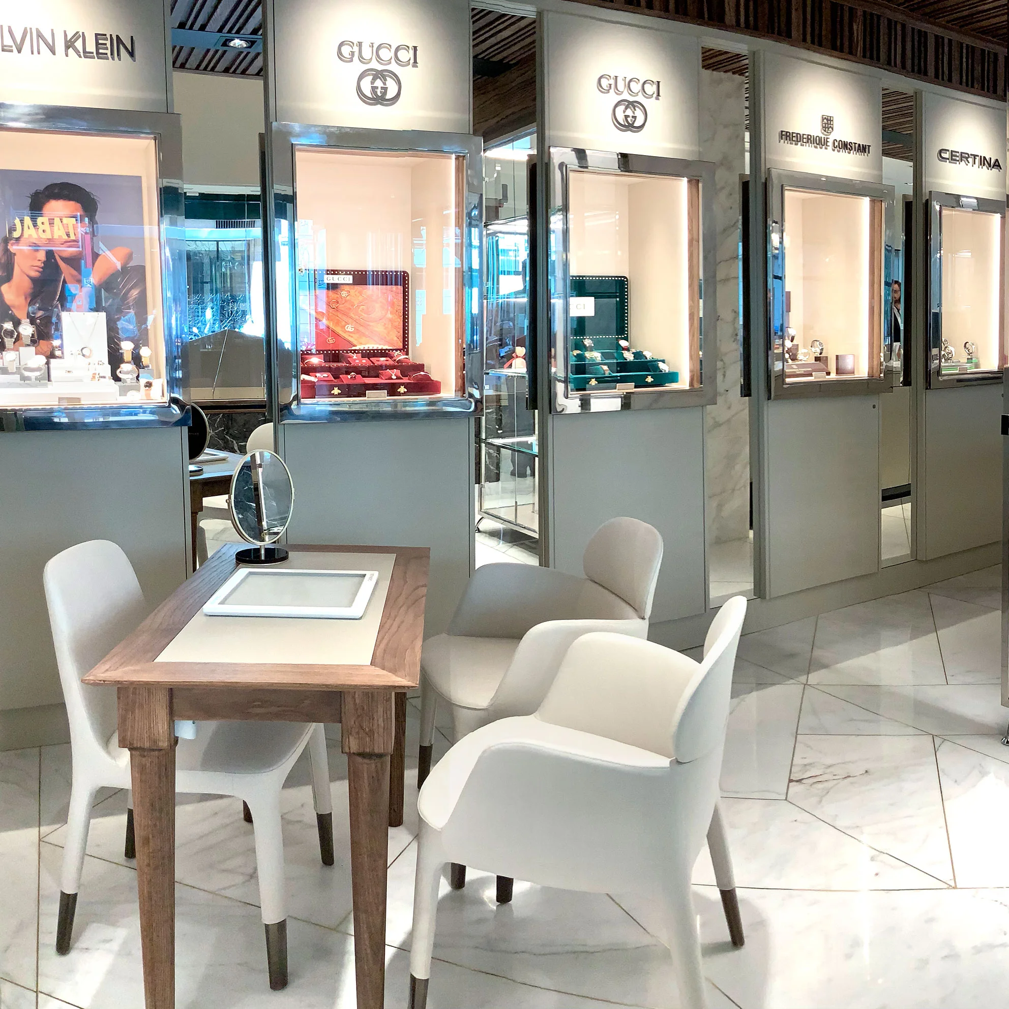 A vintage race car with blue, orange, and white livery