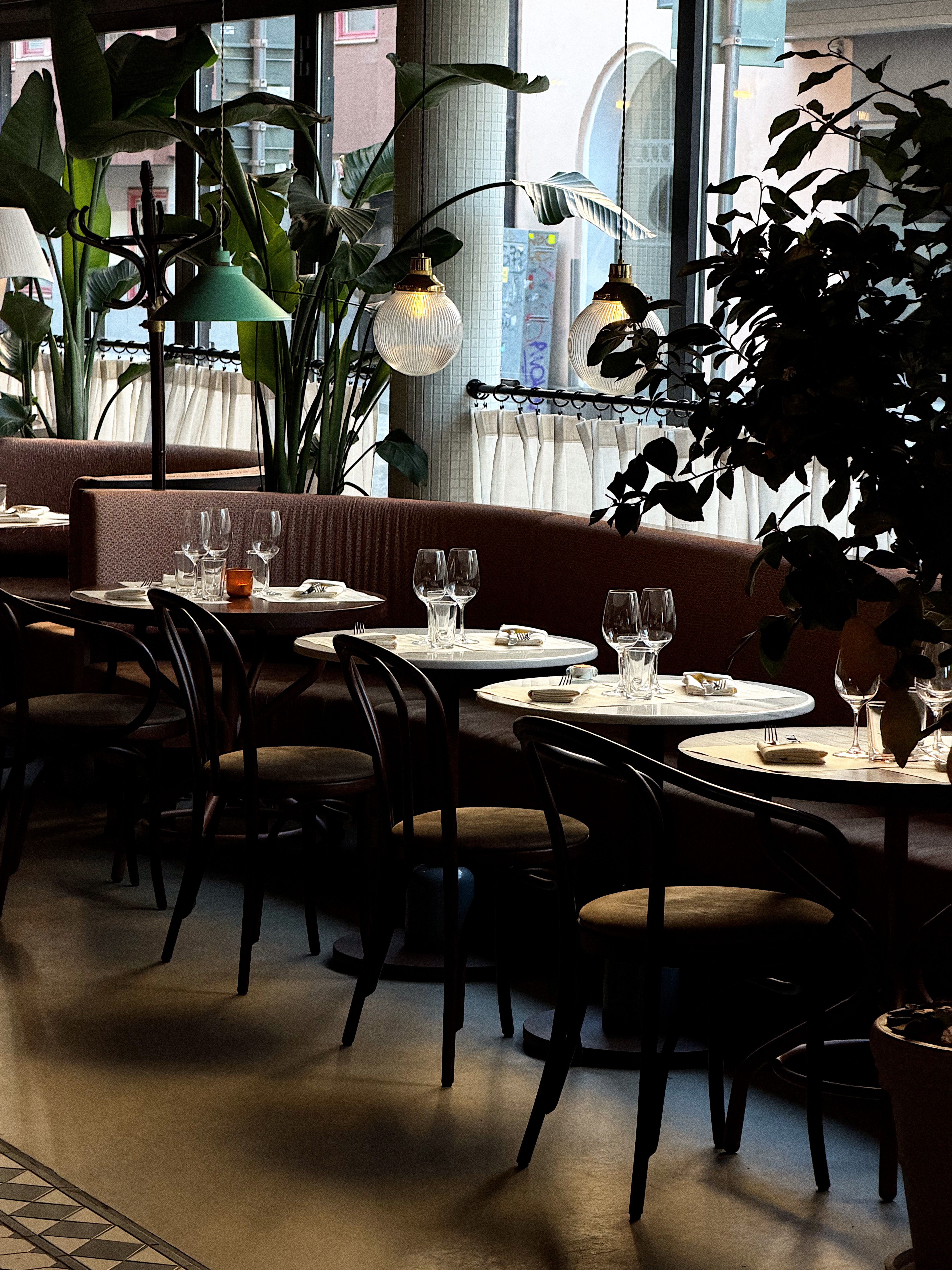 the sun is setting over a mountain range