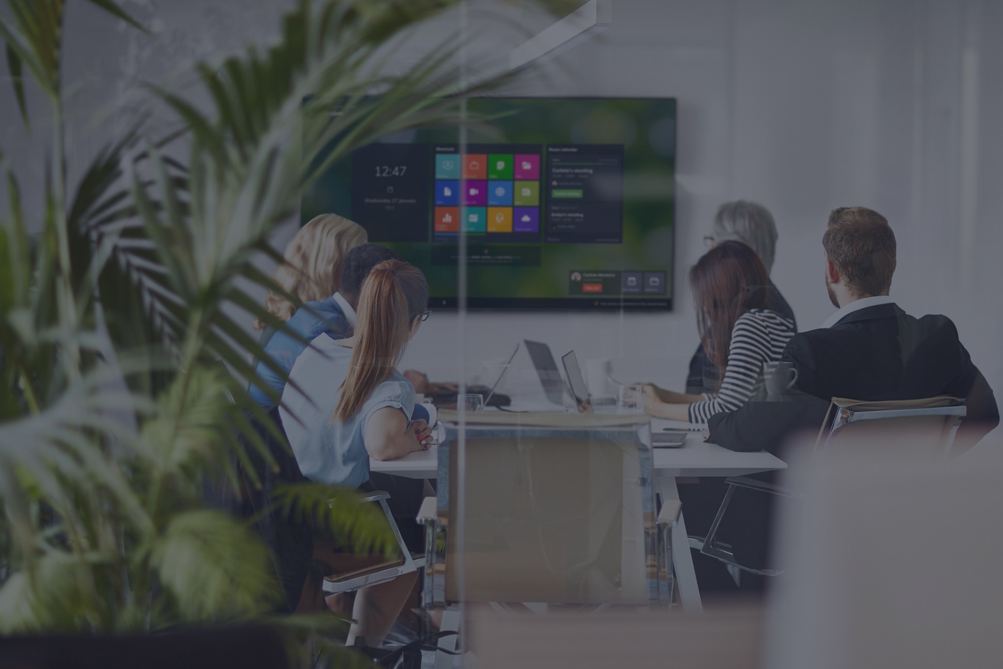 Launcher being used by a group in a meeting room