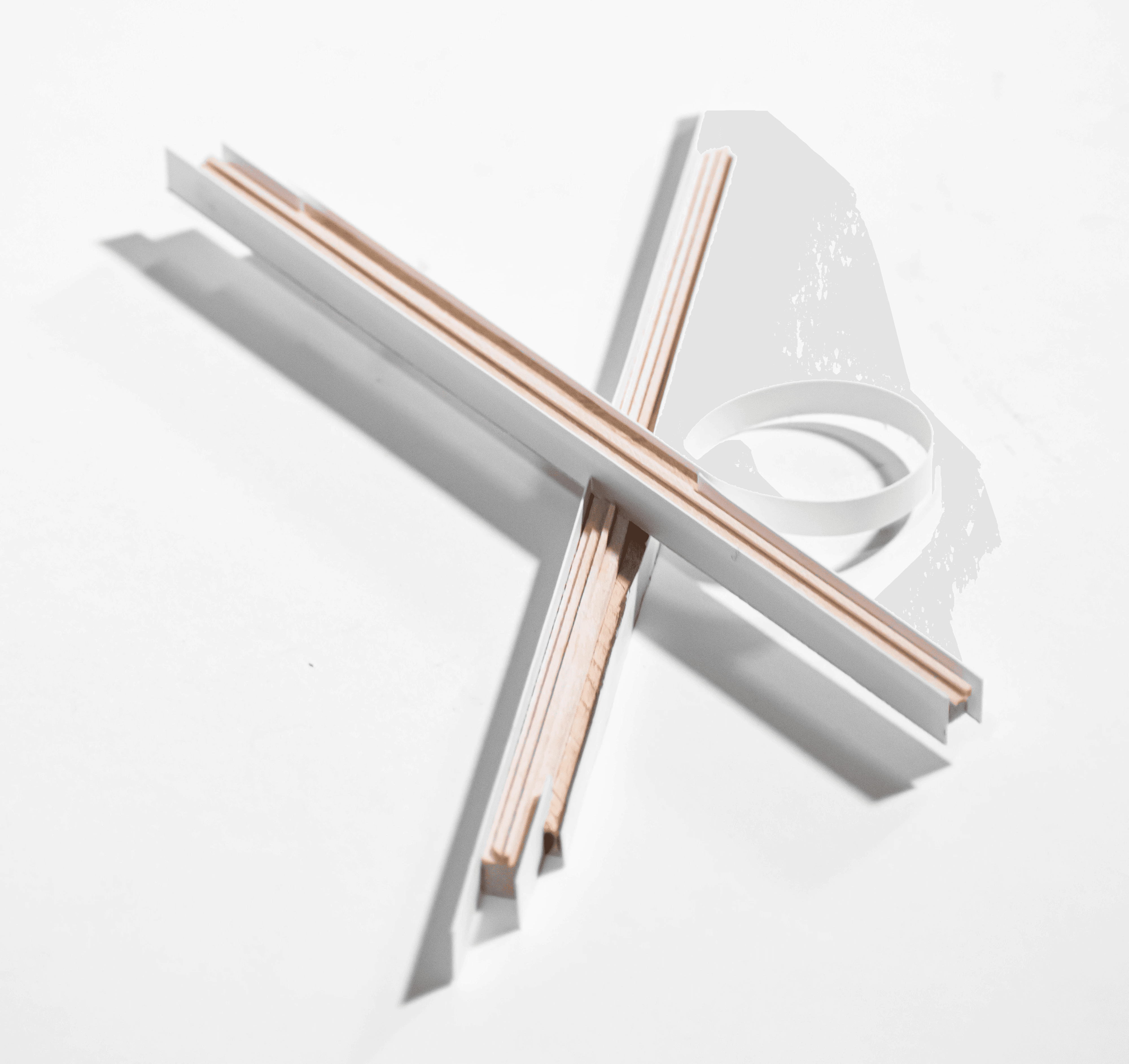 Physical sketch model further exploring the connection between two massings.