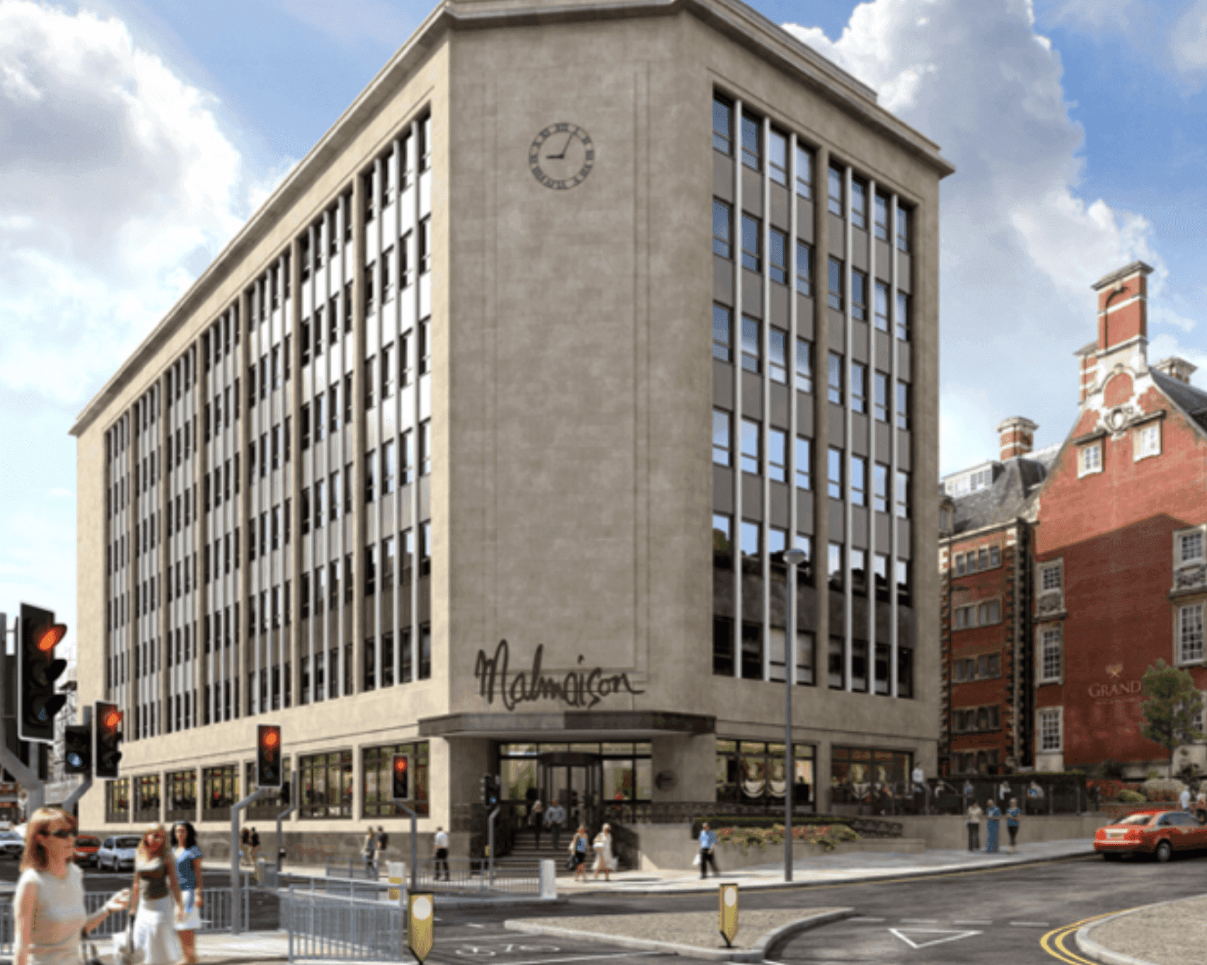 Three models standing in a wheat field, wearing beige suits.
