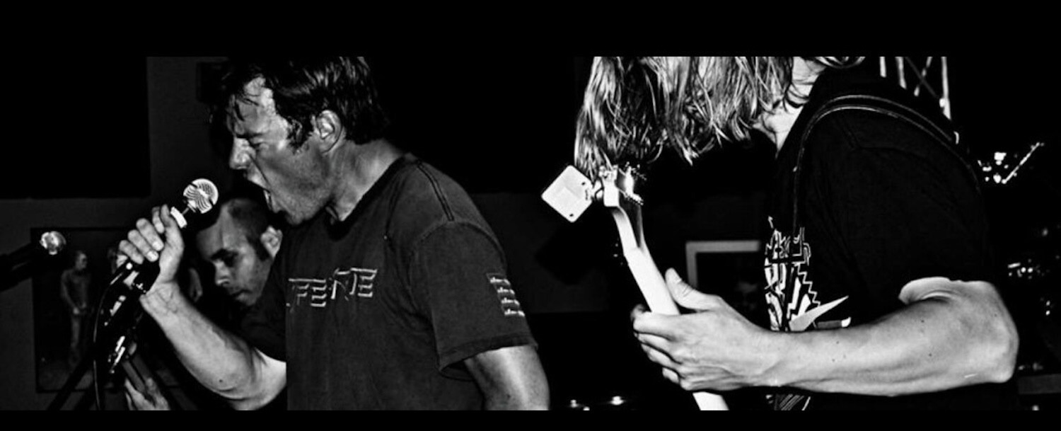 Scott Lennox performs with Sittin' Idol during an energetic live rock performance in the band's early touring years.