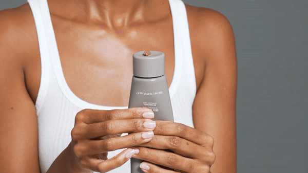 Shiba Inu dog jumping to catch falling autumn leaves