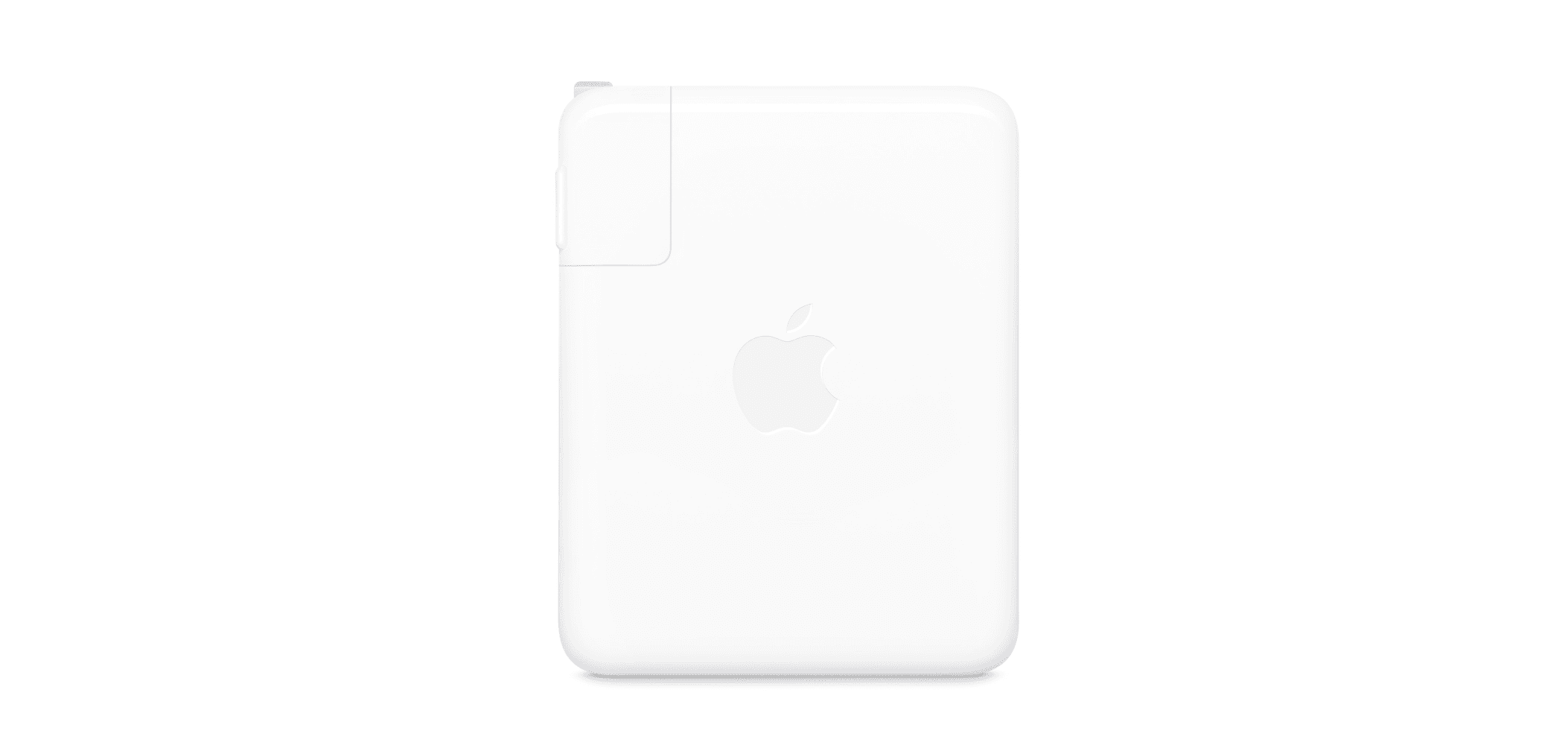 White Apple MacBook 140W USB-C power adapter with a minimalist square design and subtle Apple logo.