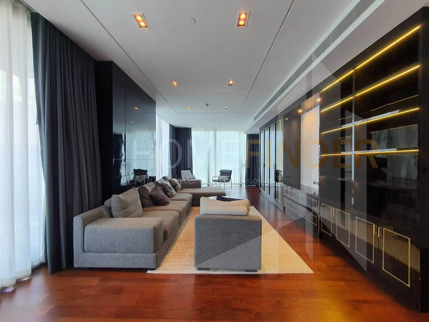 Living room in a three-bedroom residence at MARQUE Sukhumvit