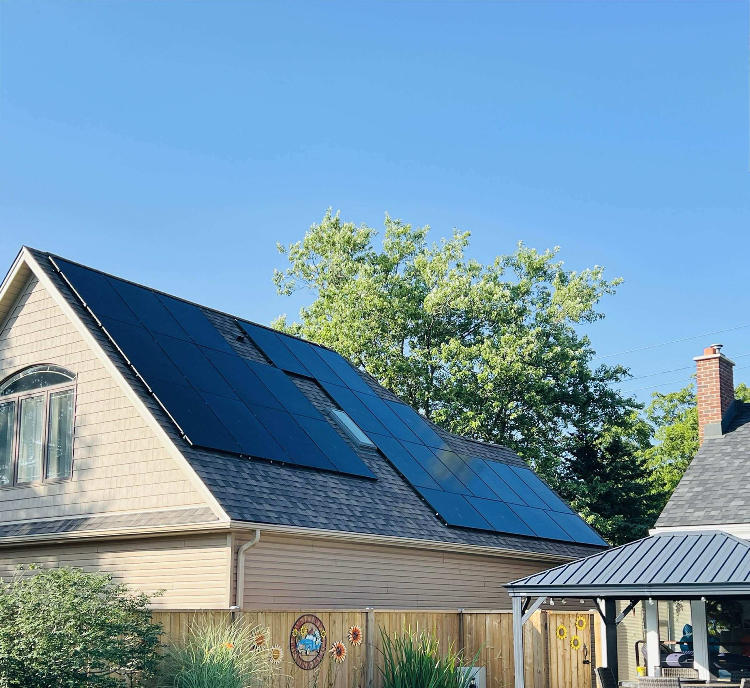 A house with Solar panels on the roof.