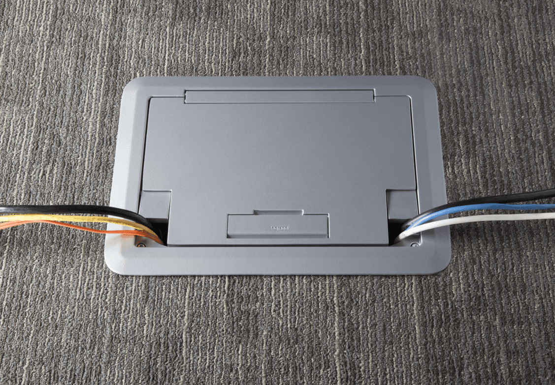 Wiremold floor boxes and poke through devices for in floor power and data access in commercial buildings in BC