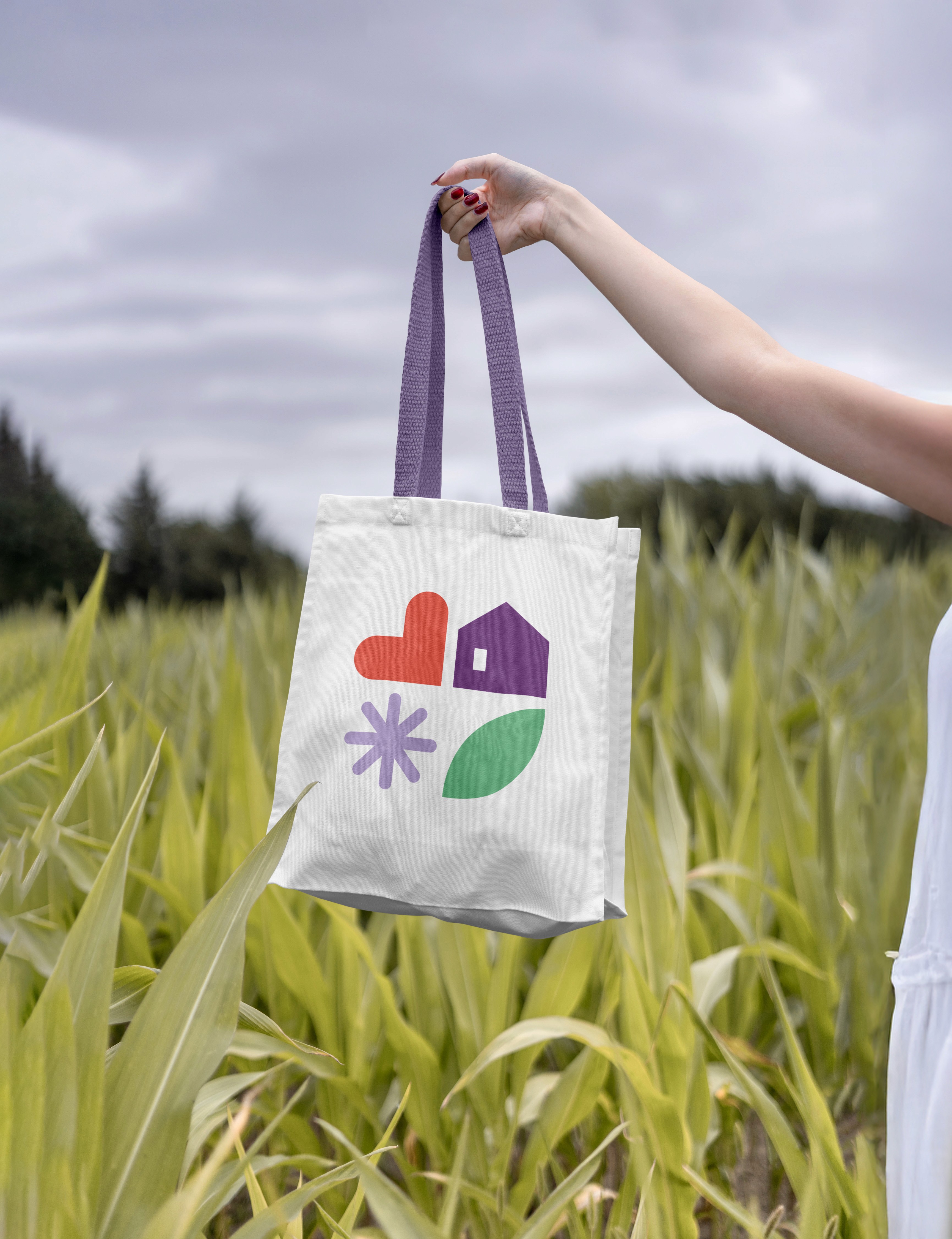 Logo de la résidence Nold, formes graphiques et couleurs pastel