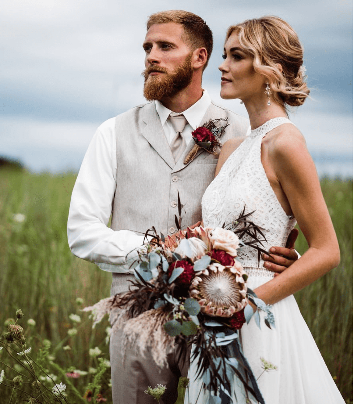 Des Moines wedding florist bouquet with protea and eucalyptus.
