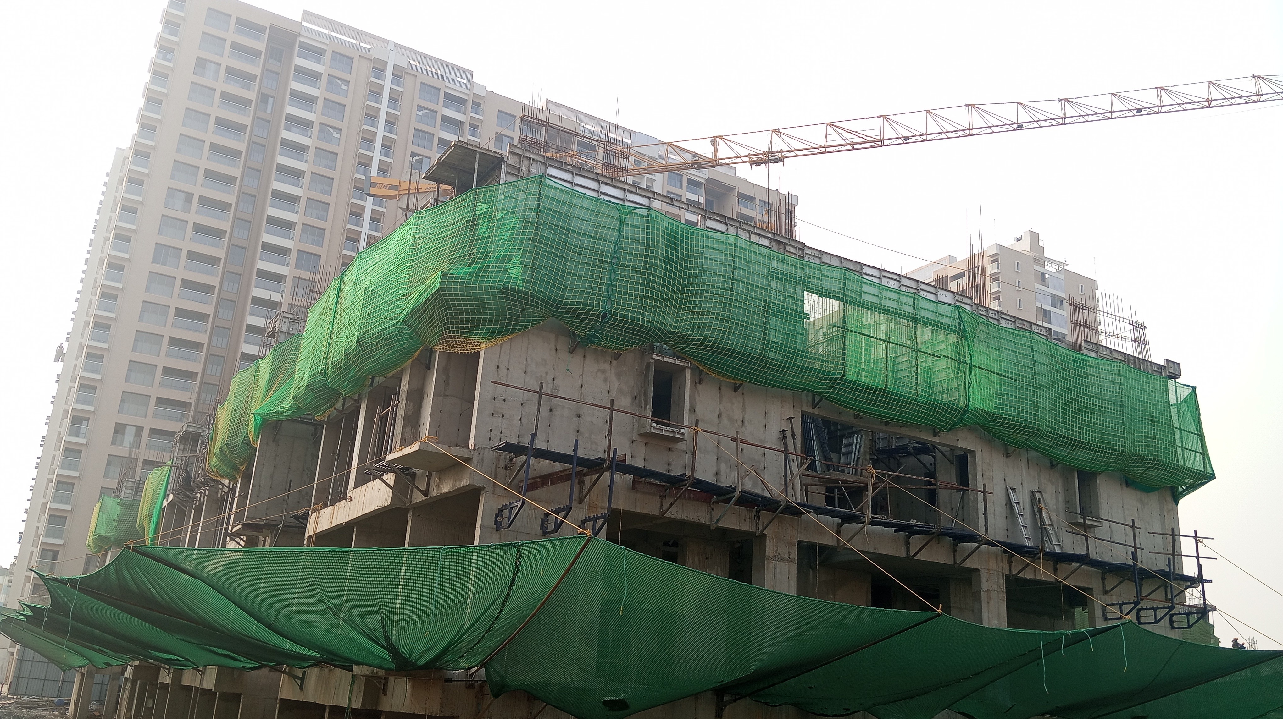 Safety net installation at high-rise construction site in Pune hadapsar