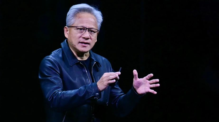 a black and white living room with a large tv