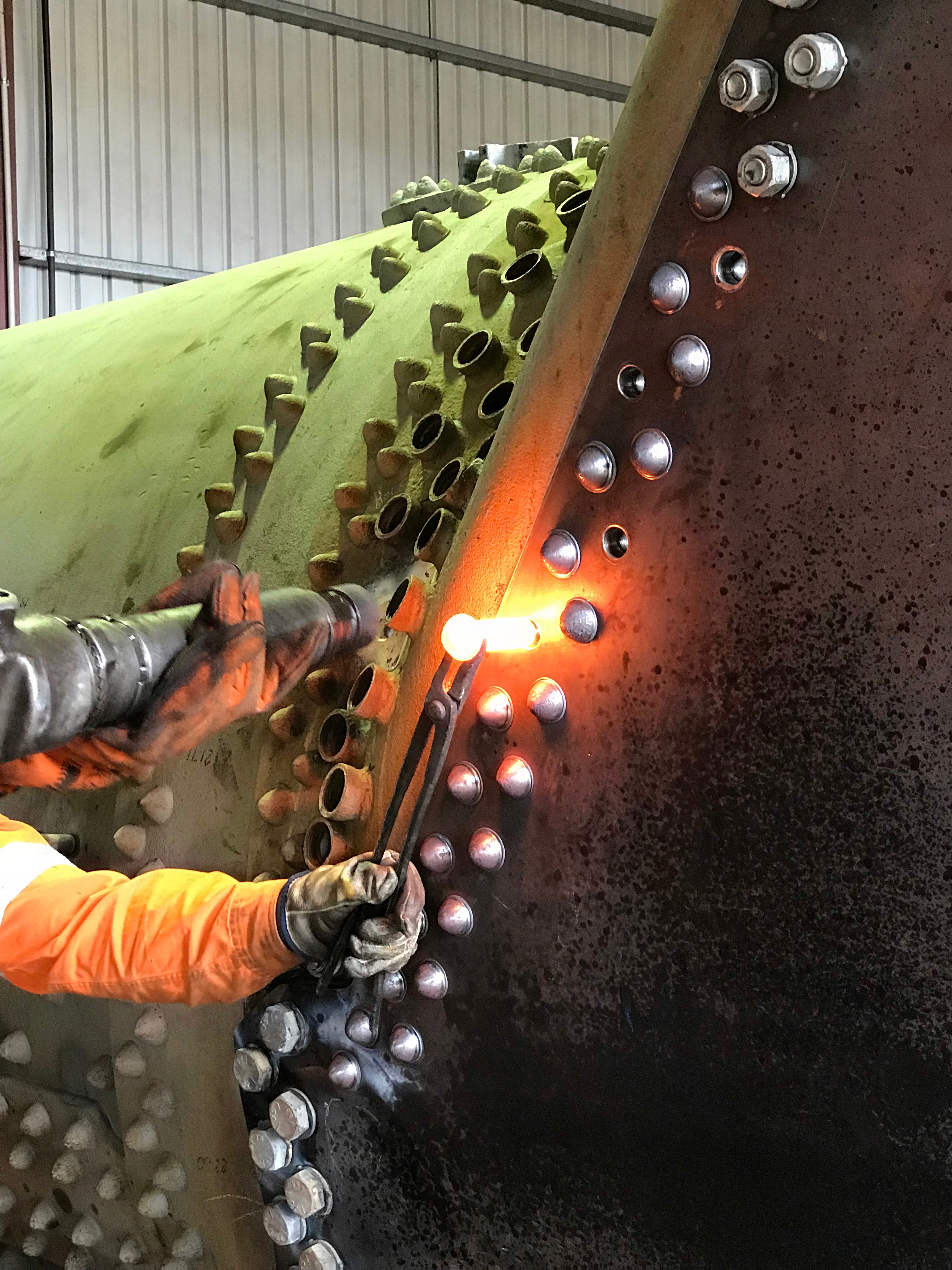 The new outer-casing side sheets have been fitted between the throat-plate and back-head and riveted in place.