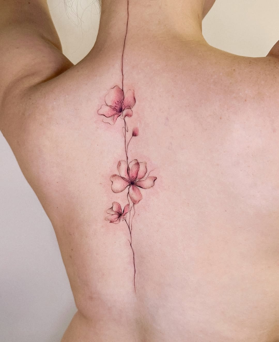 a brown leather chair sitting in front of a window