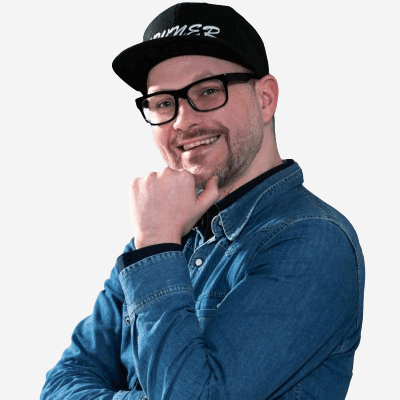 Headshot of employee, Remco Westerbroek, on a blue tinted, grey background