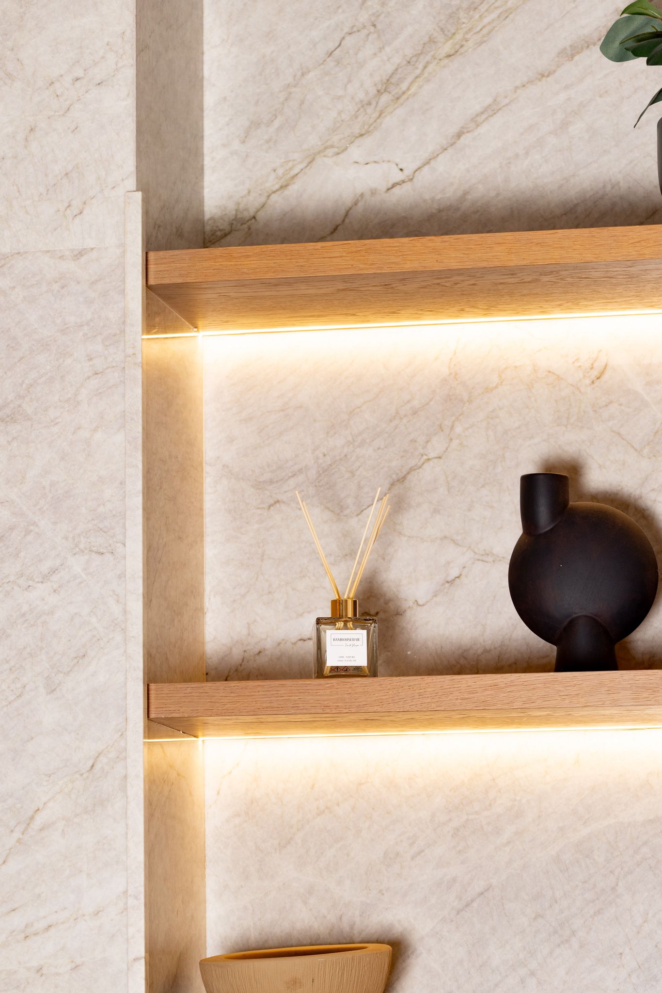 A woman holding Eden Fragrances