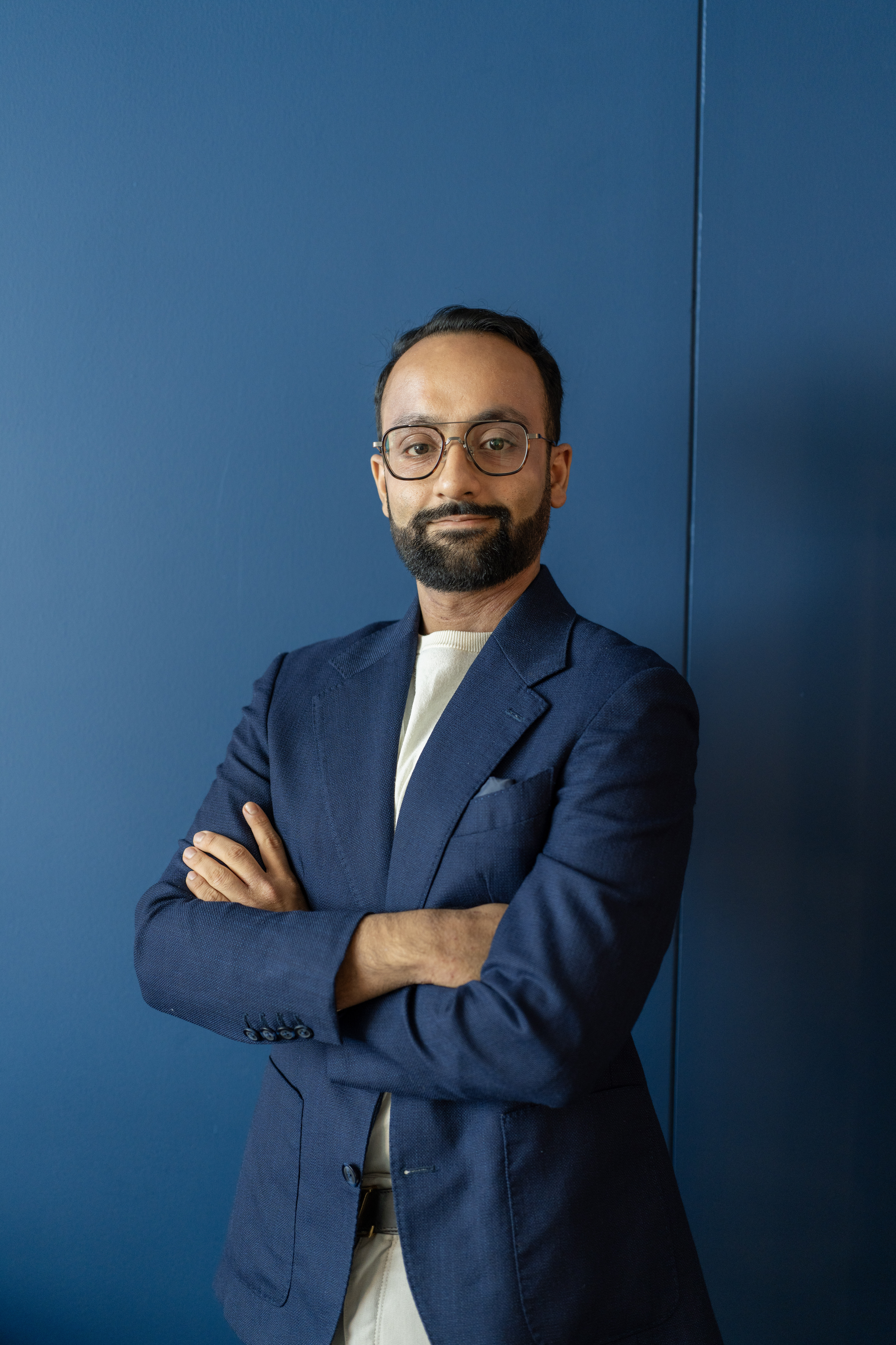 a man in blue suit