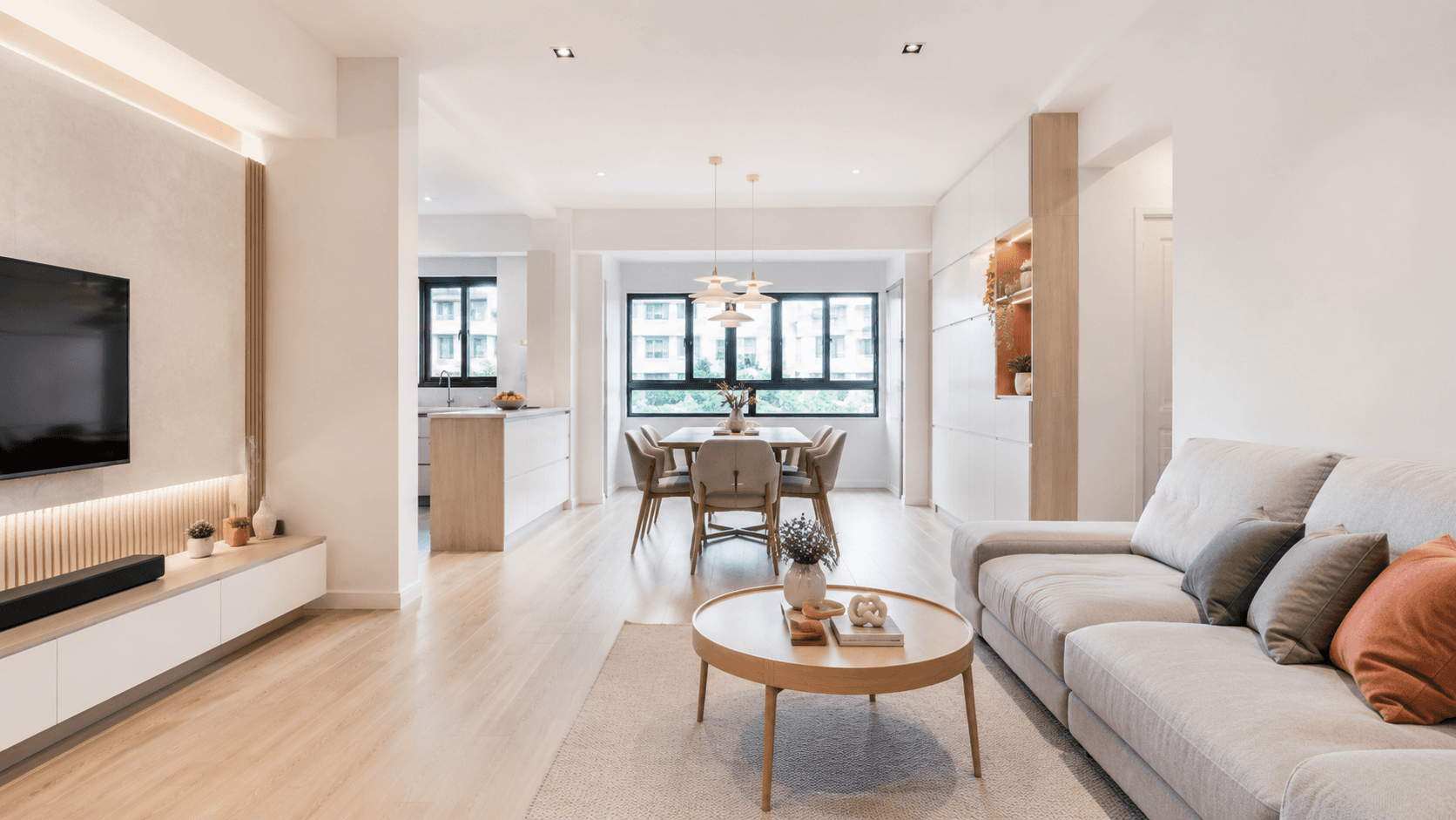 an empty room with white walls and wooden floors