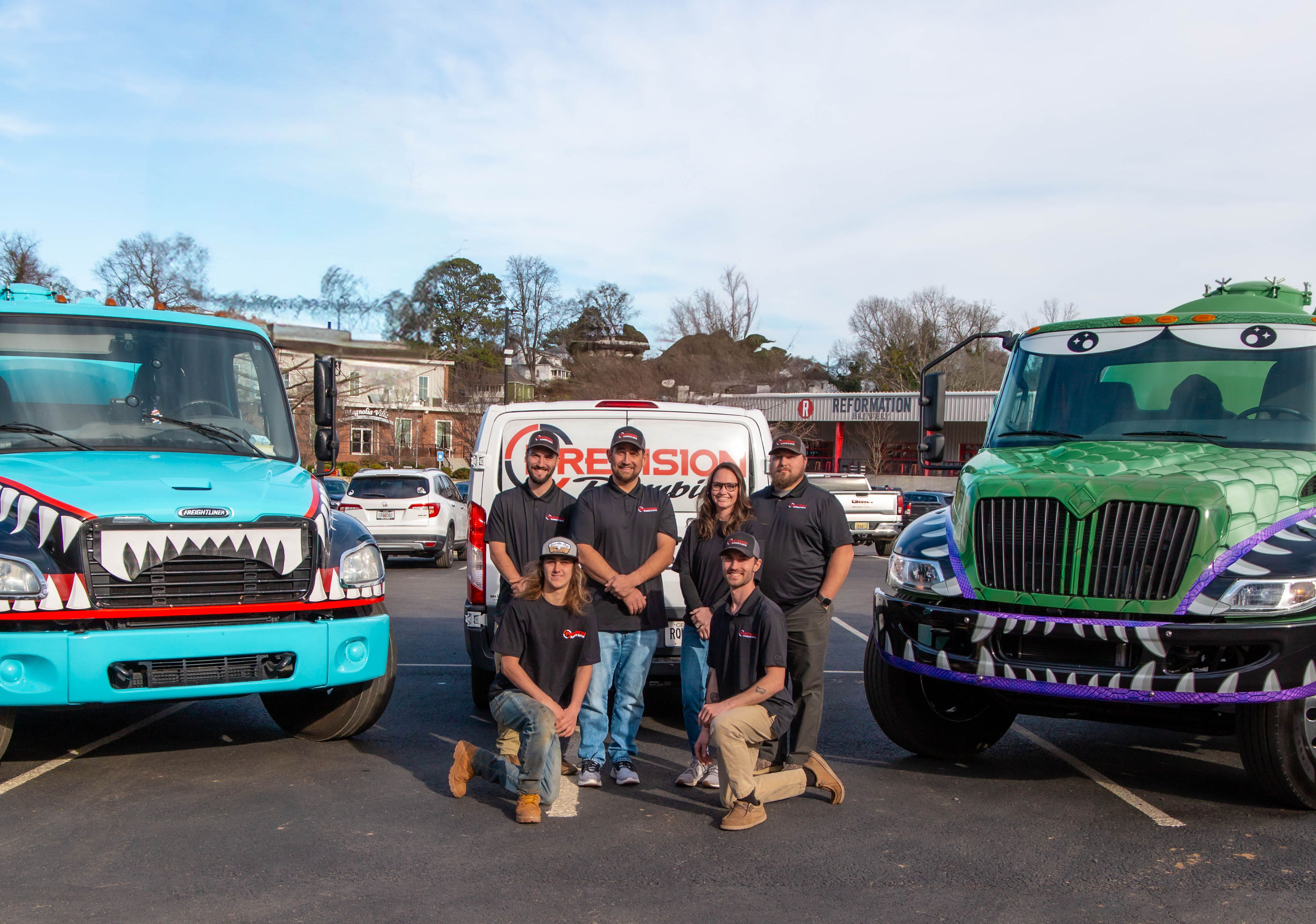 Certified technician performing septic tank pumping service in Canton, GA