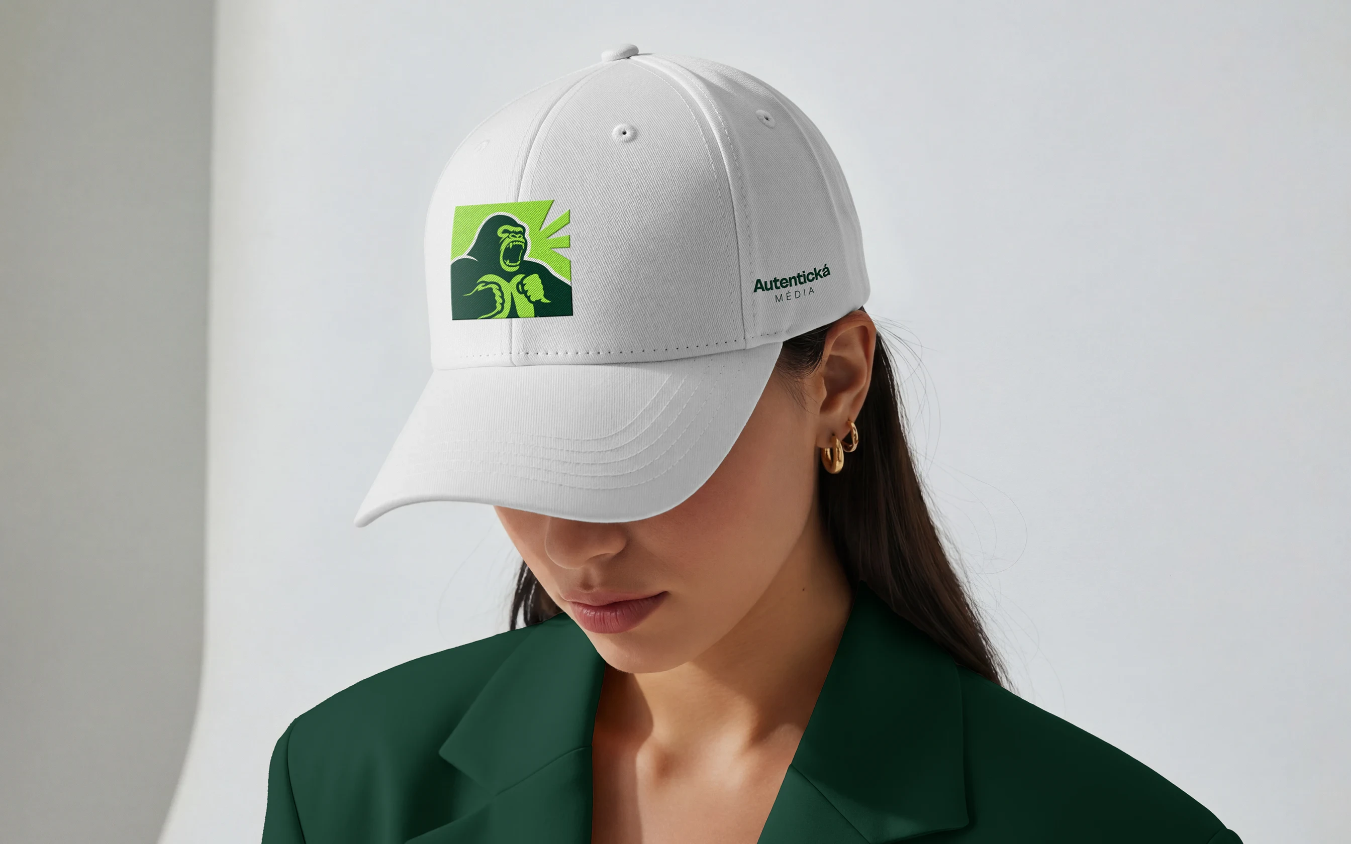 Cap with gorilla logo mockup for Autentická Media.