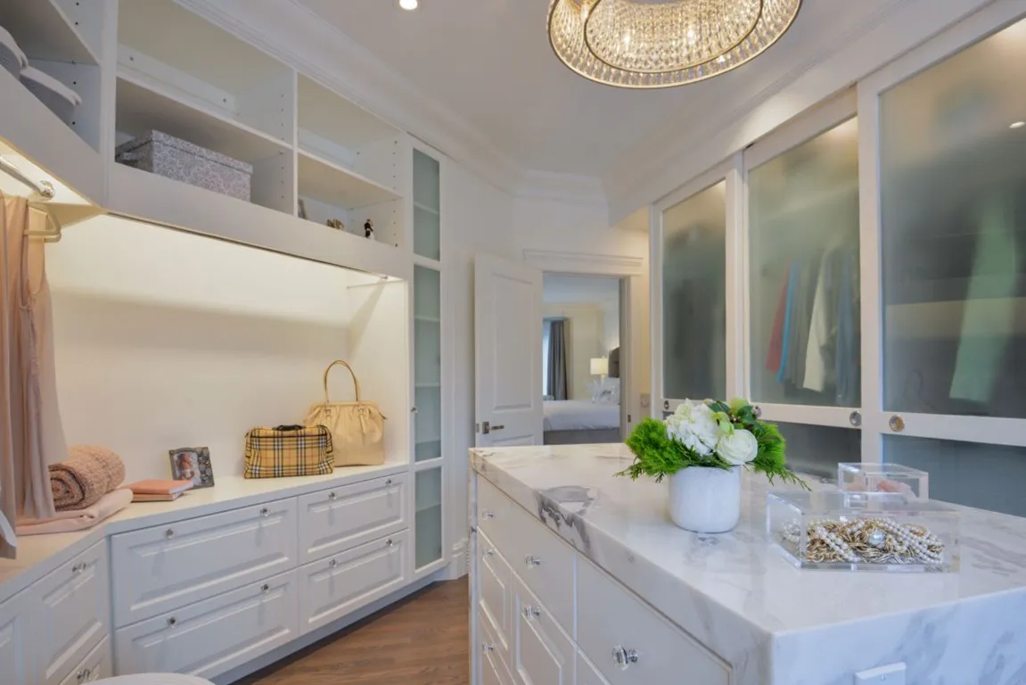 Image of Luxurious primary ensuites with custom cabinetry, marble countertops, and elegant design by KHD Homes.