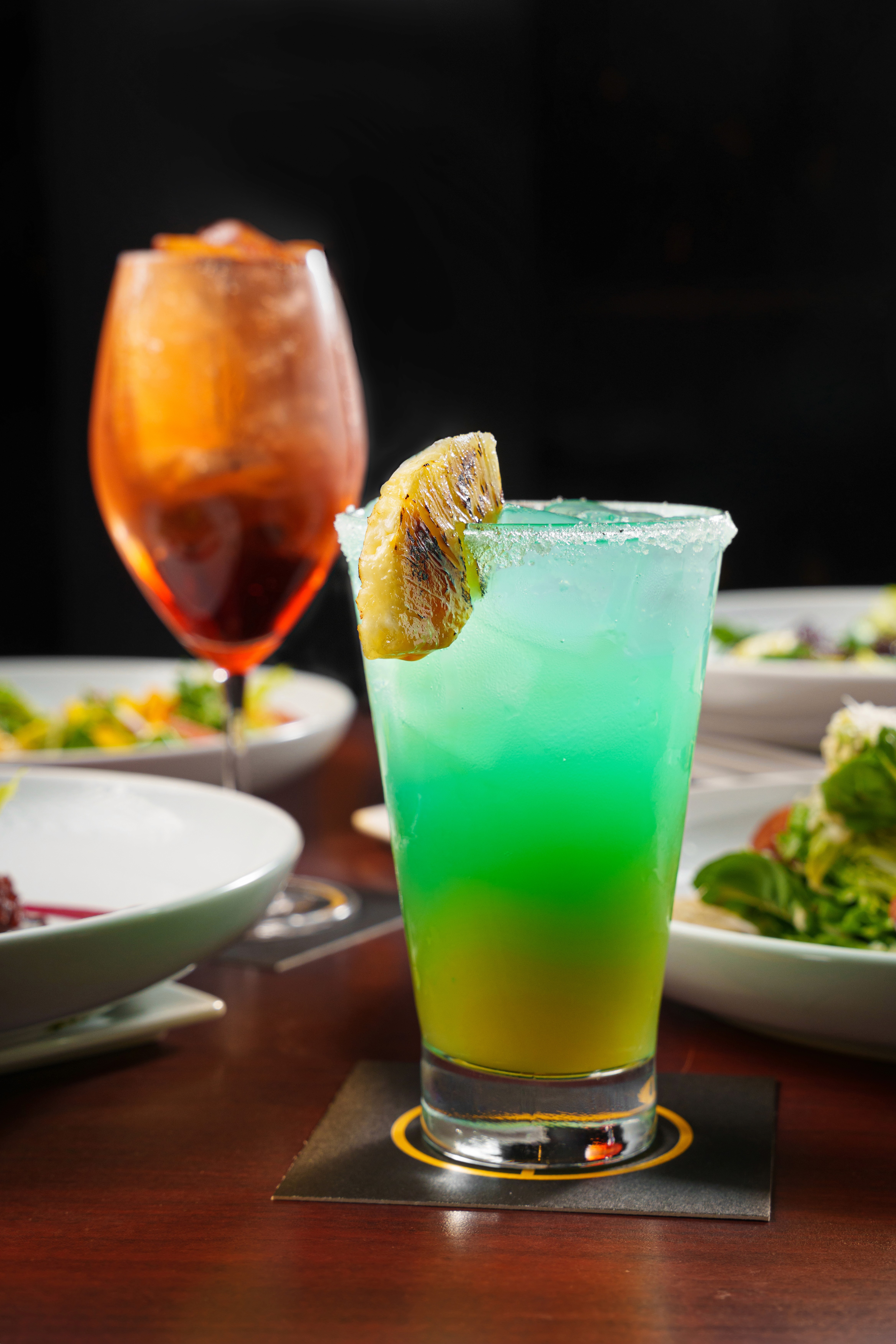 lifestyle photo of dining table with cocktails