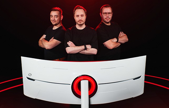 Creative workspace with large windows and a wall full of inspiration boards.