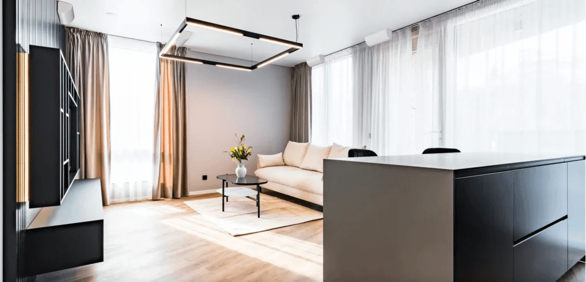 Modern living room with sofa, coffee table, and island