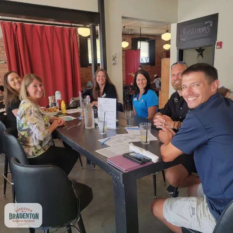 7 people seated at table bradenton