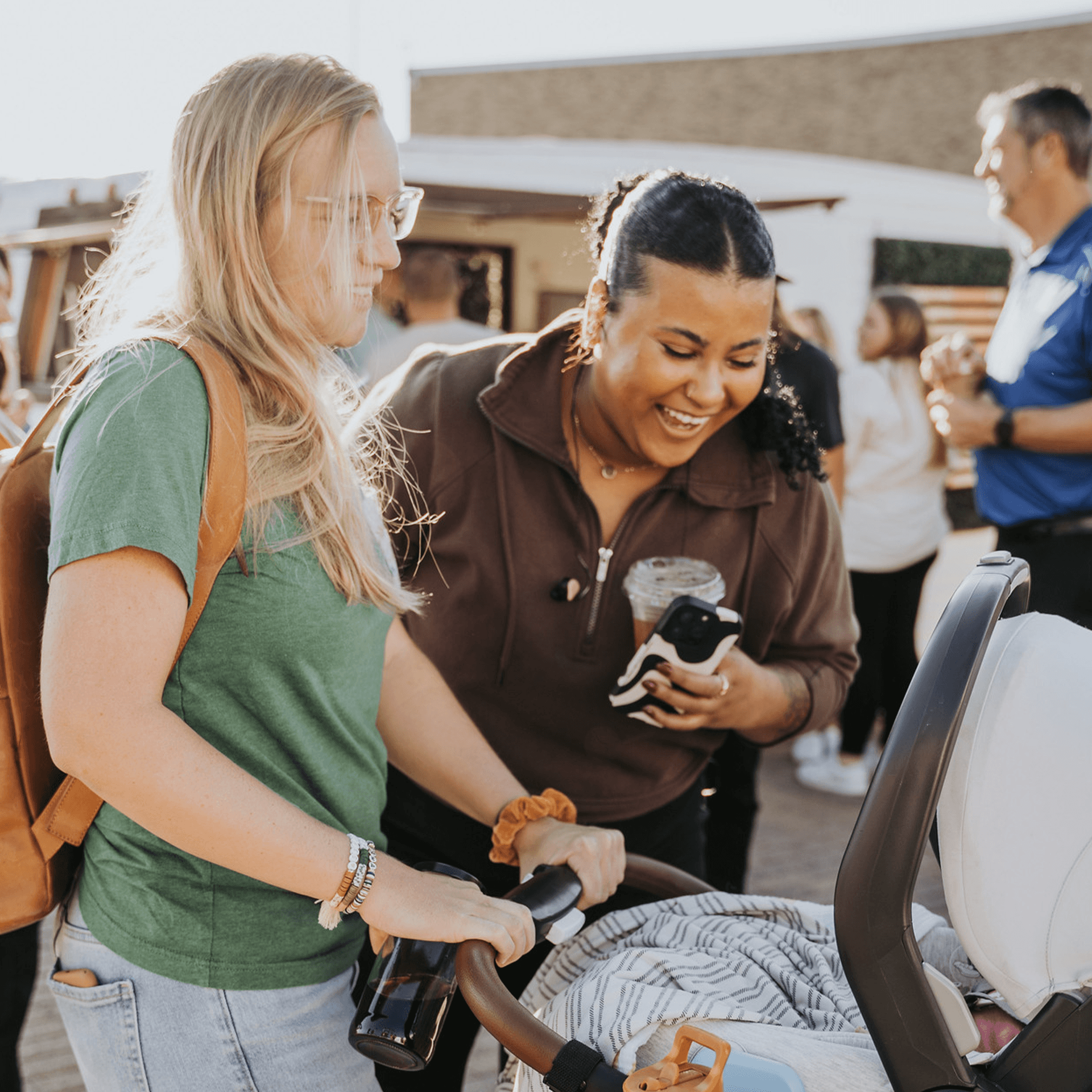 Friends talking to a child.