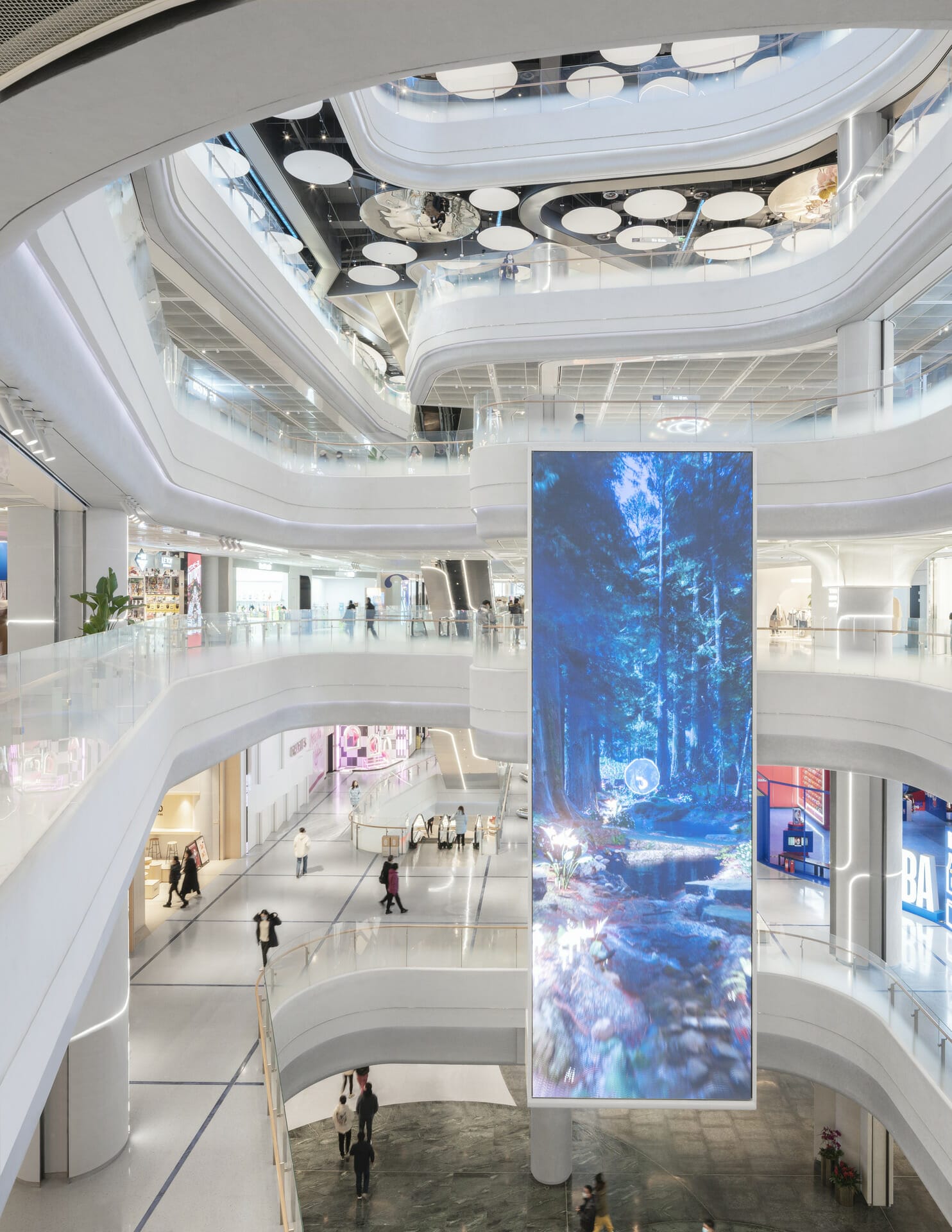 Streetside billboard with flyposters of the Batch.Works brand and illustrations