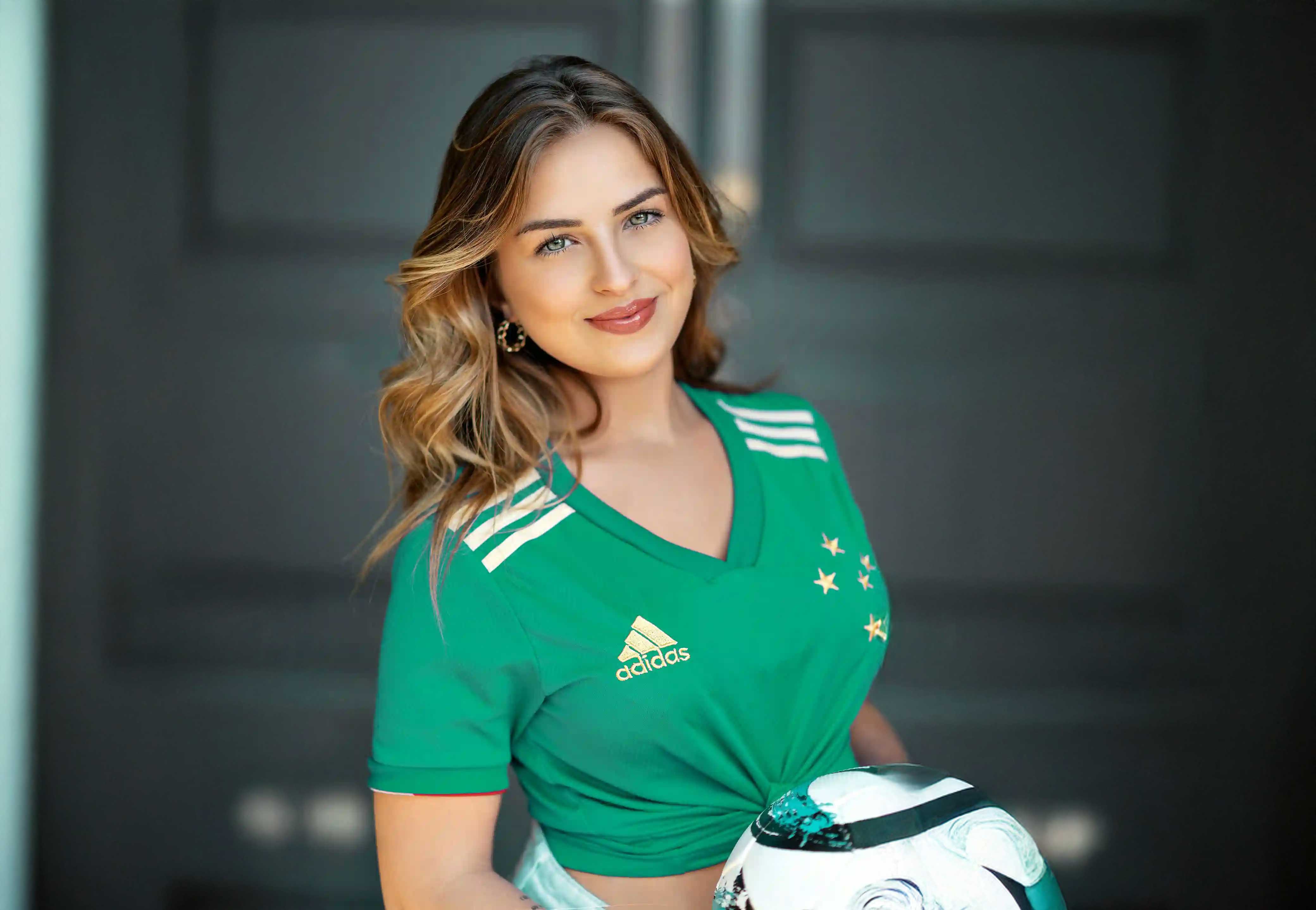 Women wearning a green adidas shirt