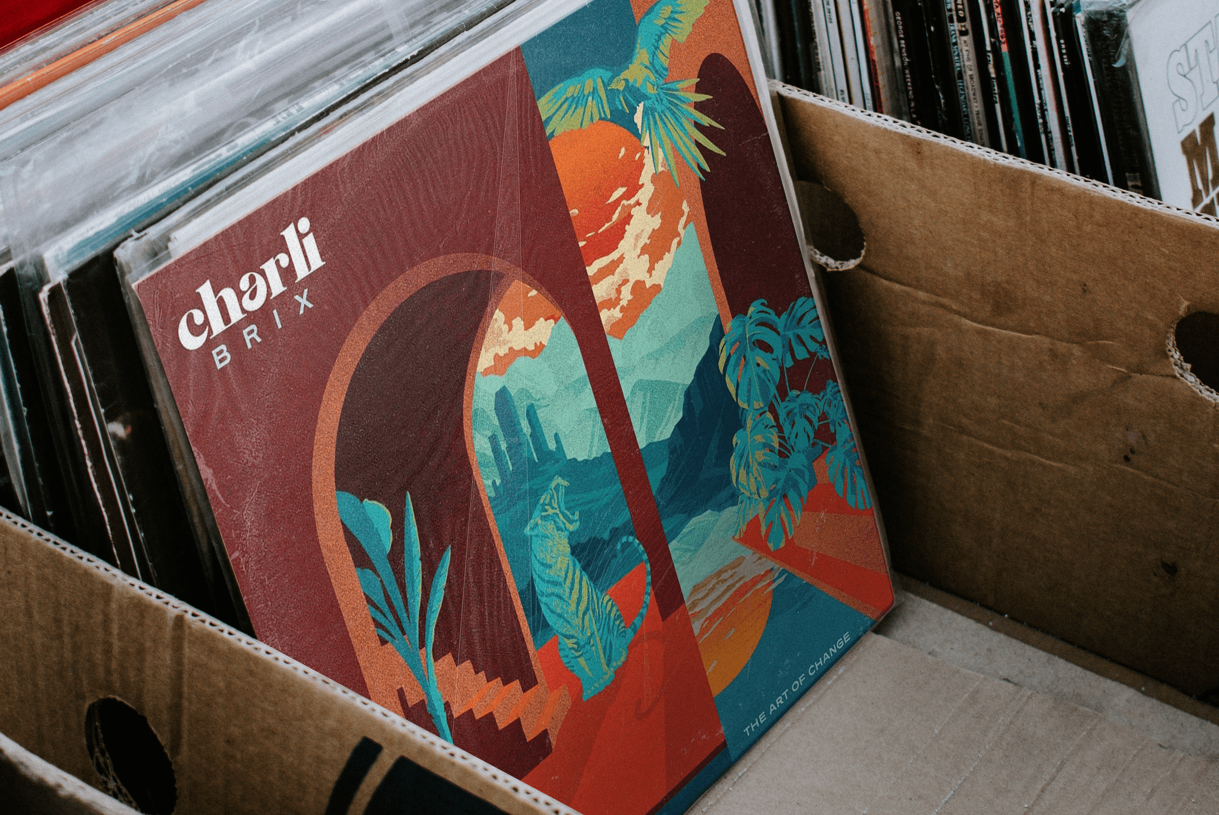 Charli Brix vinyl record sleeve design by Tom - co founder of LINKS Studio, shown in a crate of records