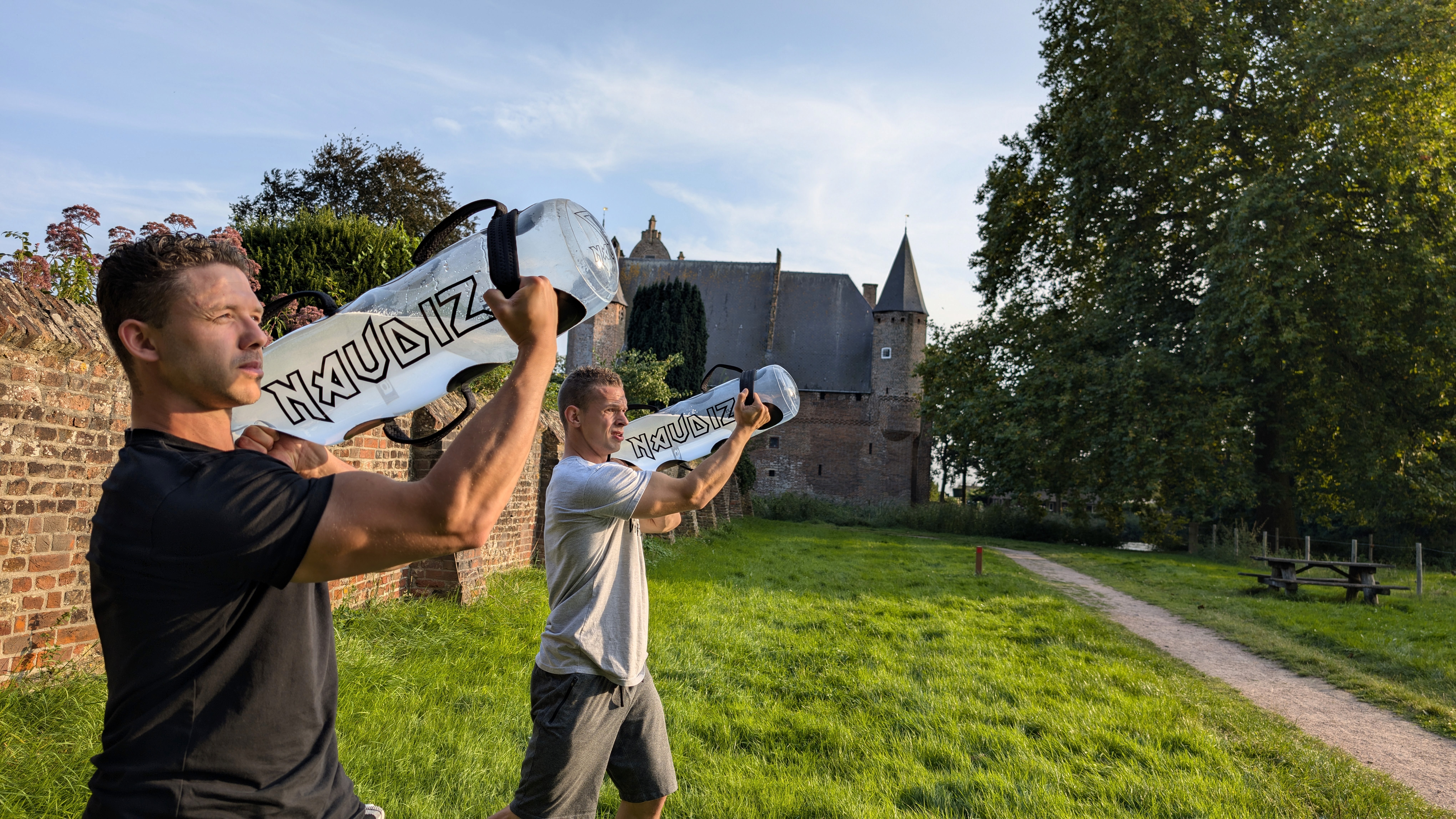 Medium shot woman helping man exercise