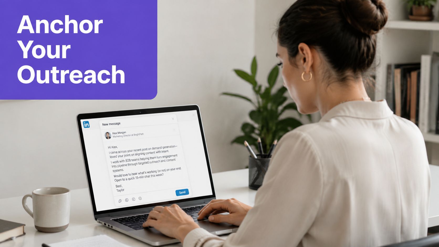 A woman working on a laptop typing a professional sales outreach message on the LinkedIn platform.