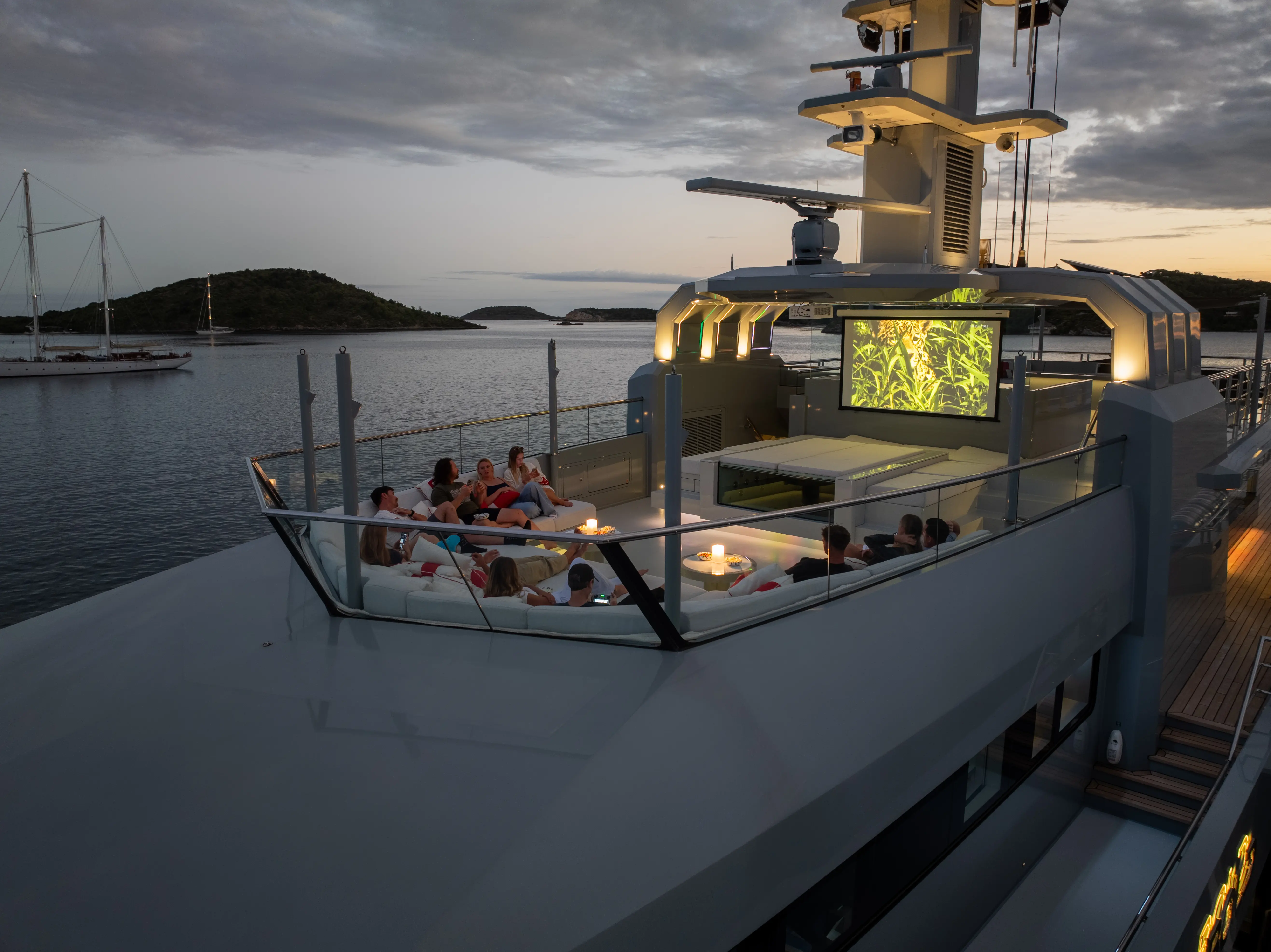 Cozy forest-view tea house with rustic wooden table.