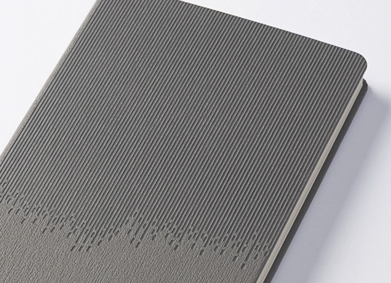 Close-up detail of ribbed textured journal cover surface