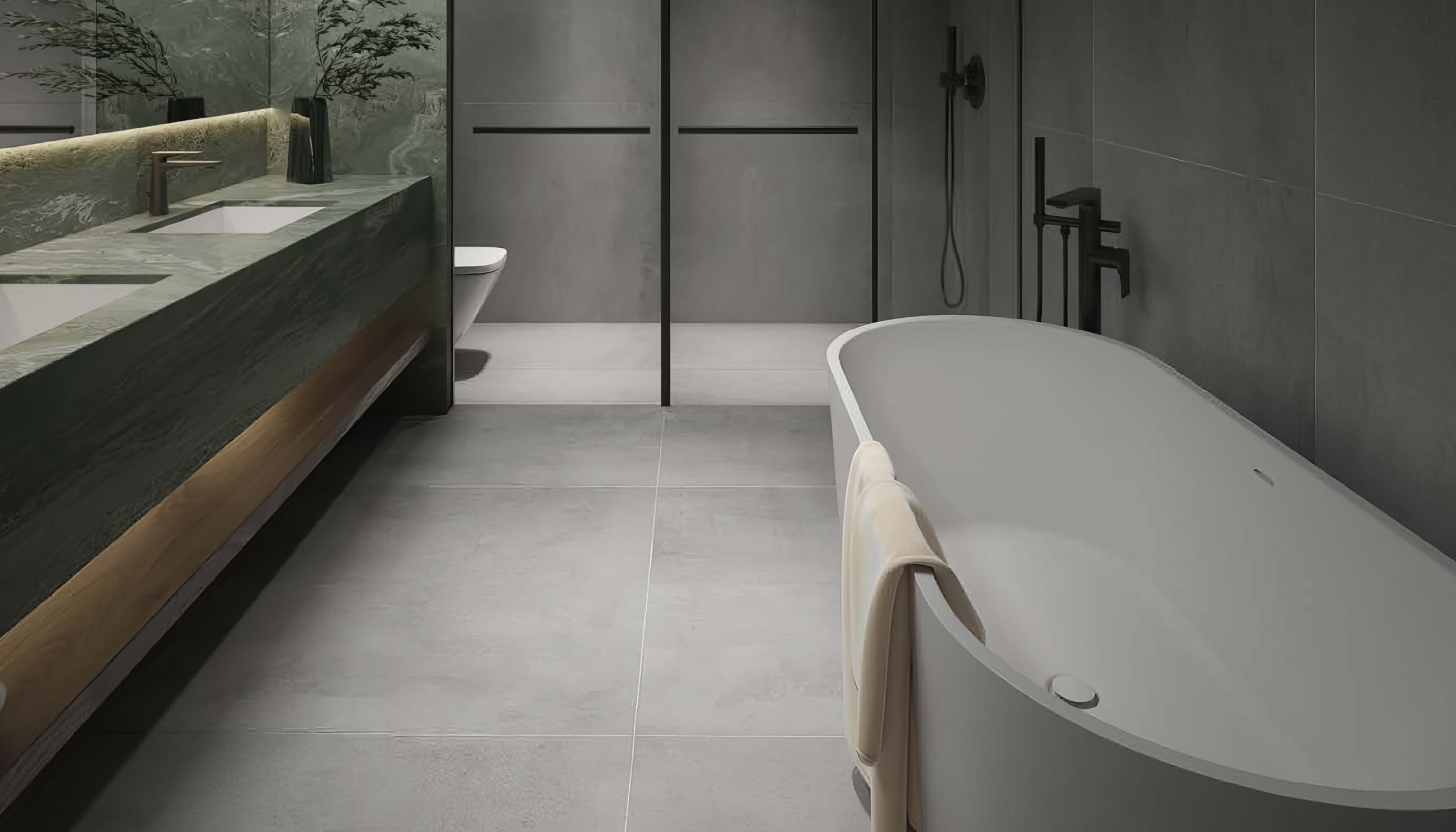 A modern bathroom at W Residences with high-end fixtures and a soaking tub.