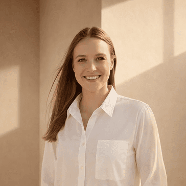 Laura, clinic staff member smiling in professional setting