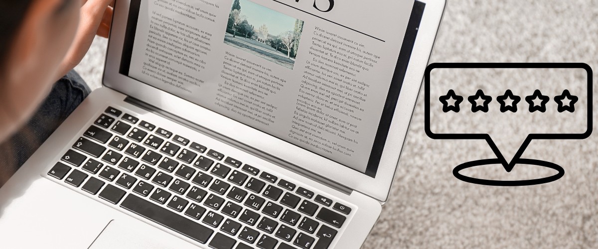 Laptop displaying an online article next to a five-star rating speech-bubble icon, representing customer reviews and content evaluation.