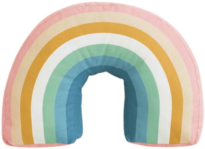 Rainbow-shaped pillow representing the Game stage — lightness, creativity and strategy through play.