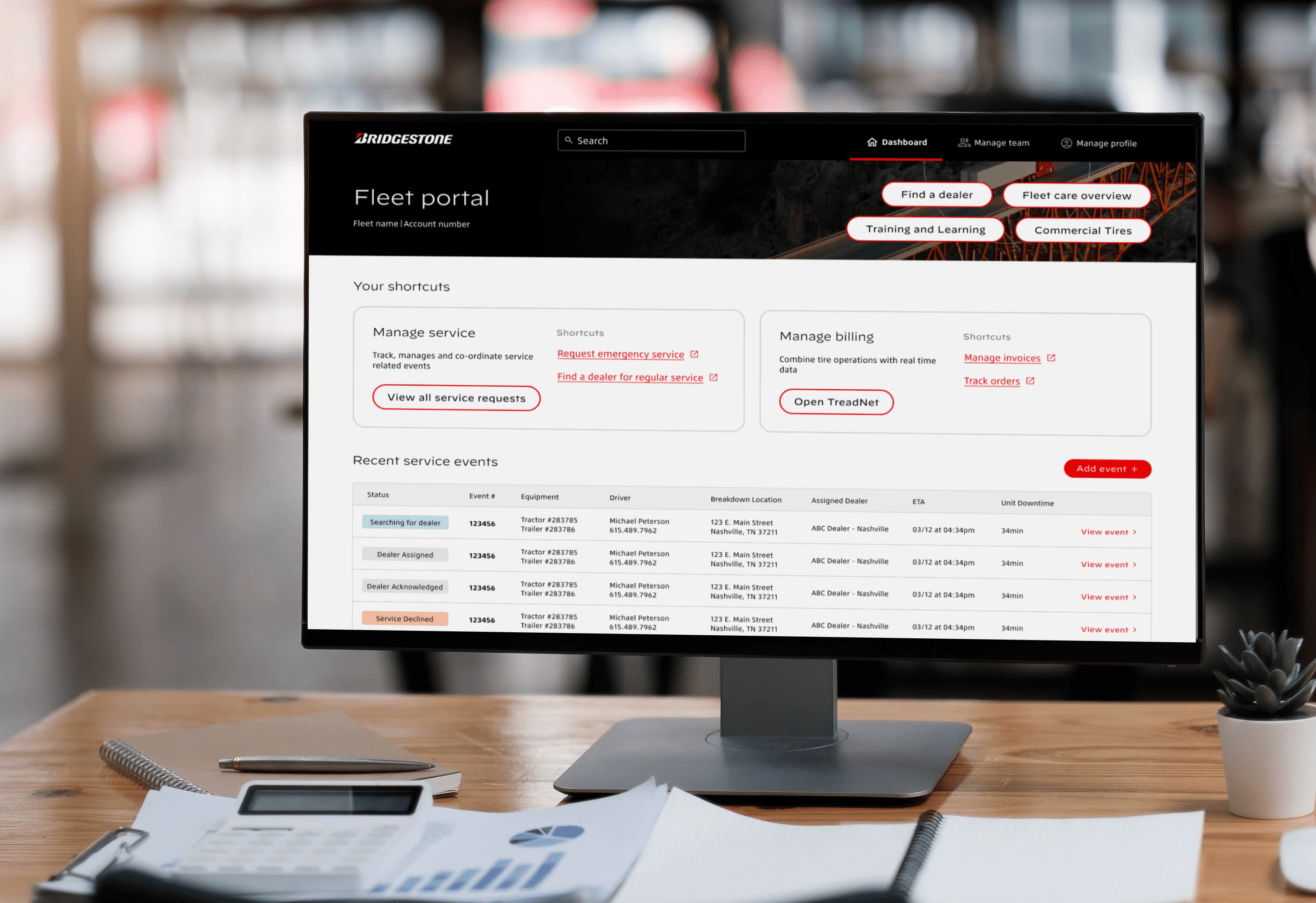 Image of the fleet portal open on a computer screen in a fleet managers office